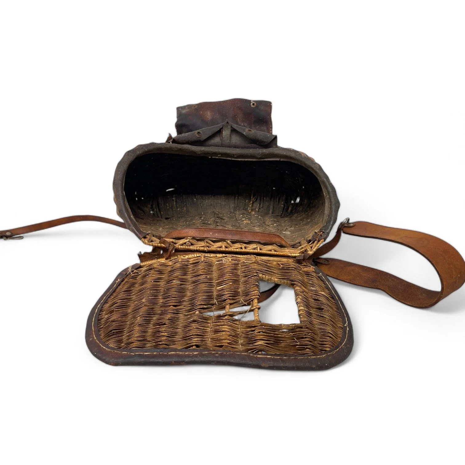 Vintage large fishing creel with leather strap with hand tooled butterflies, leaves, and flowers.
