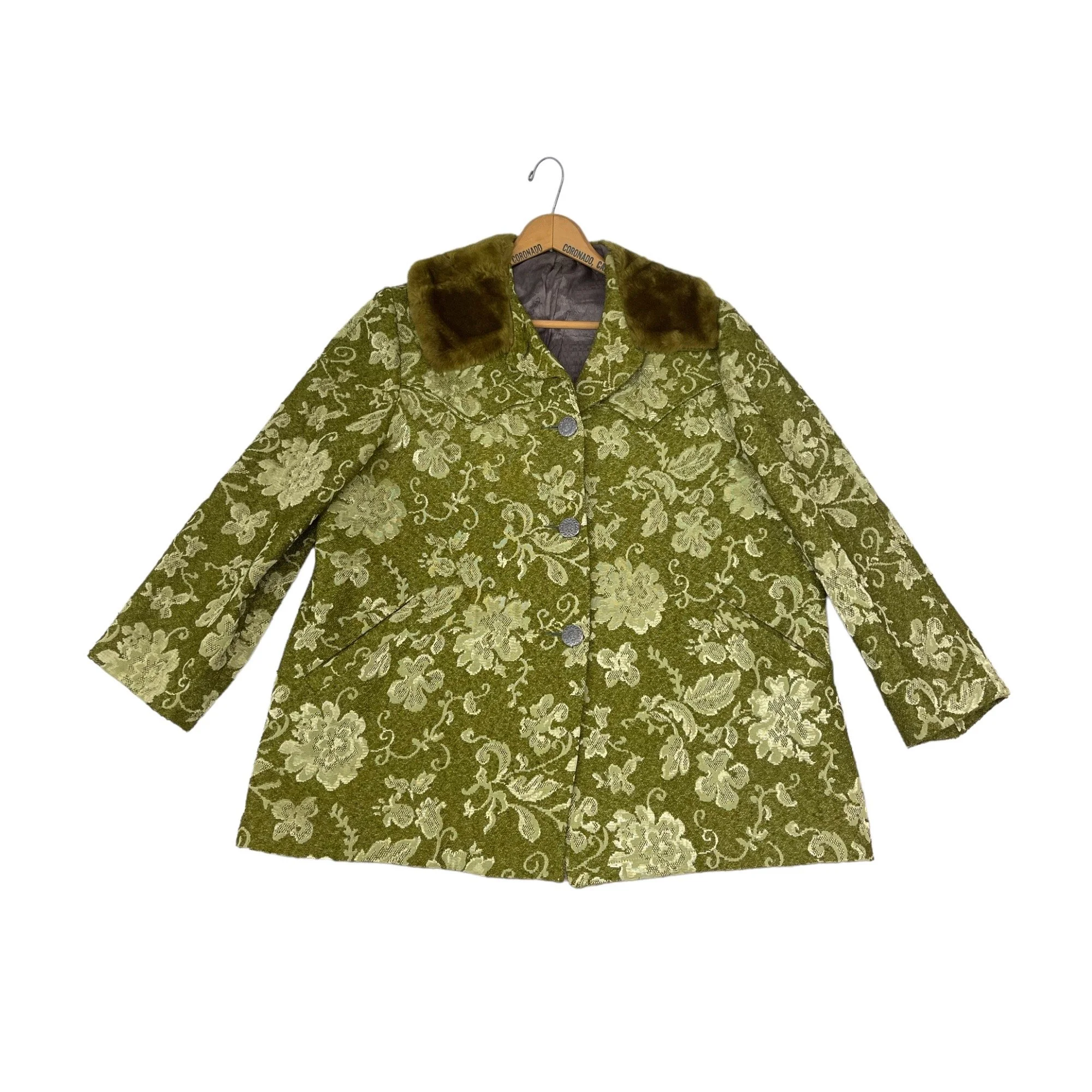 Vintage 1960s women's Westwear jacket in green floral tapestry, classic ranch style with button front closure, fully lined, front pockets, and western yoke detailing.