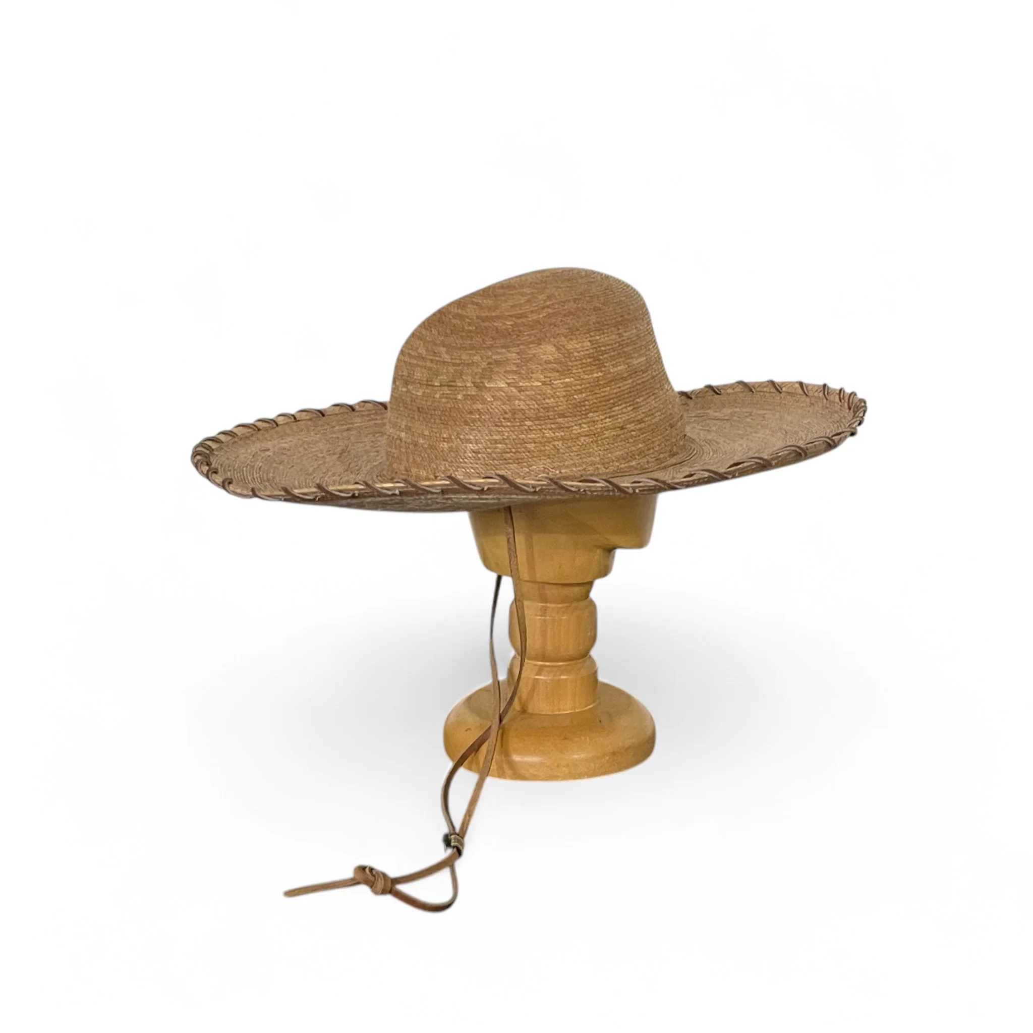 Vintage straw, palm leaf Sombrero Hat with leather whipstitch and chin strap. Authentic Mexican High Crowned, Doreman Burns artist.