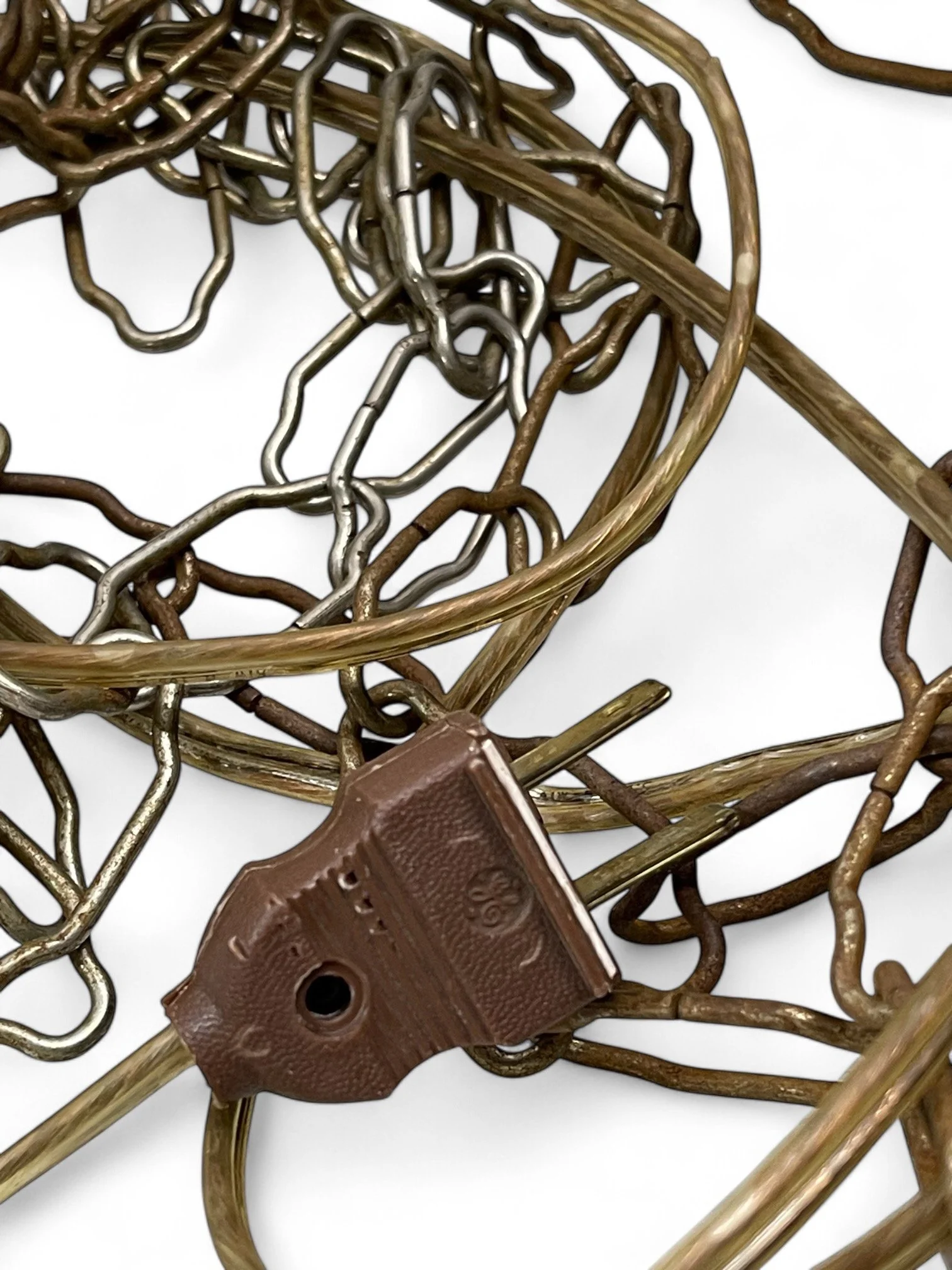 Vintage square lucite hanging swag light with chain. This unique pendant light features a geometric woven lucite design in a rich smoky grey, creating a warm, ambient glow when lit.