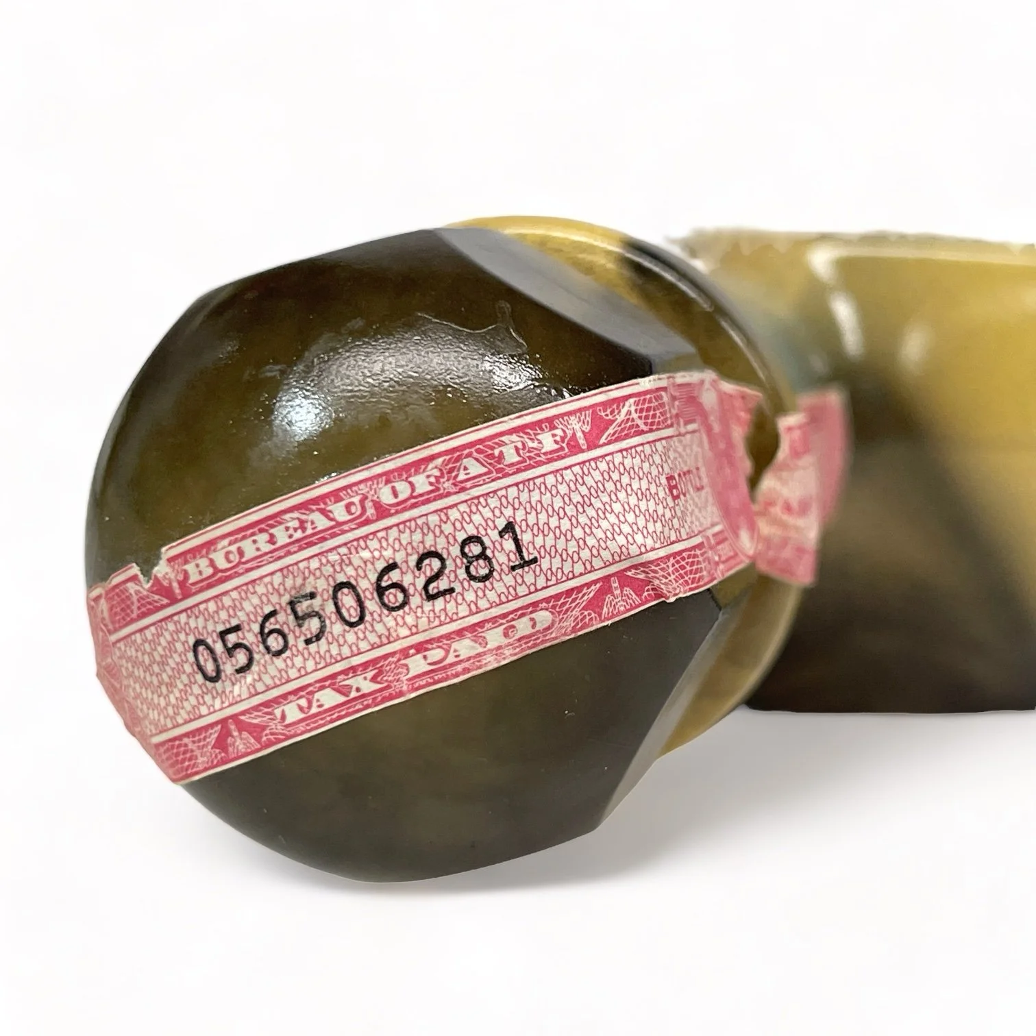 Vintage pair of glass 1970s Jim Beam Choice liquor bottles, featuring the cowboy and the Indian trapper. Perfect home bar decor.