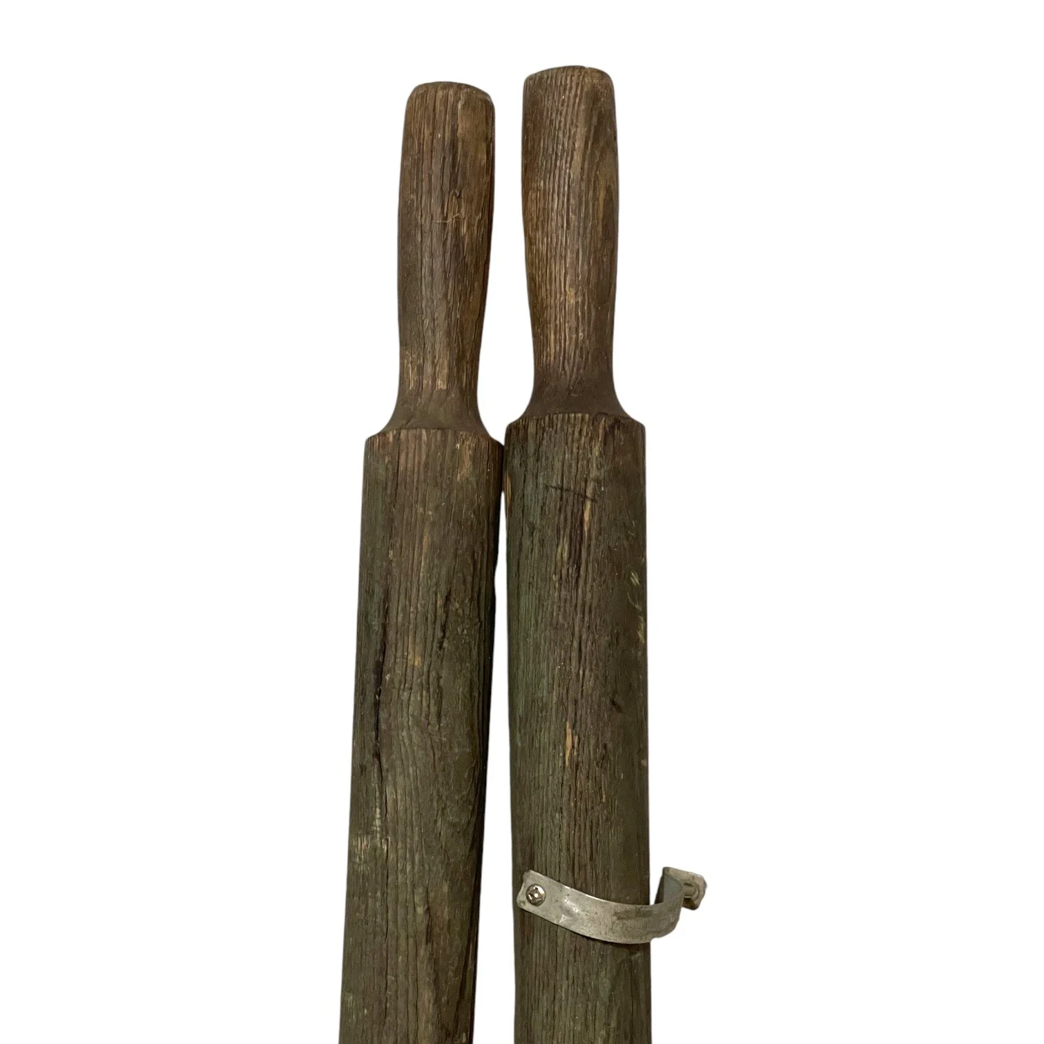 Pair of vintage wooden green boat oars with metal and oar locks.