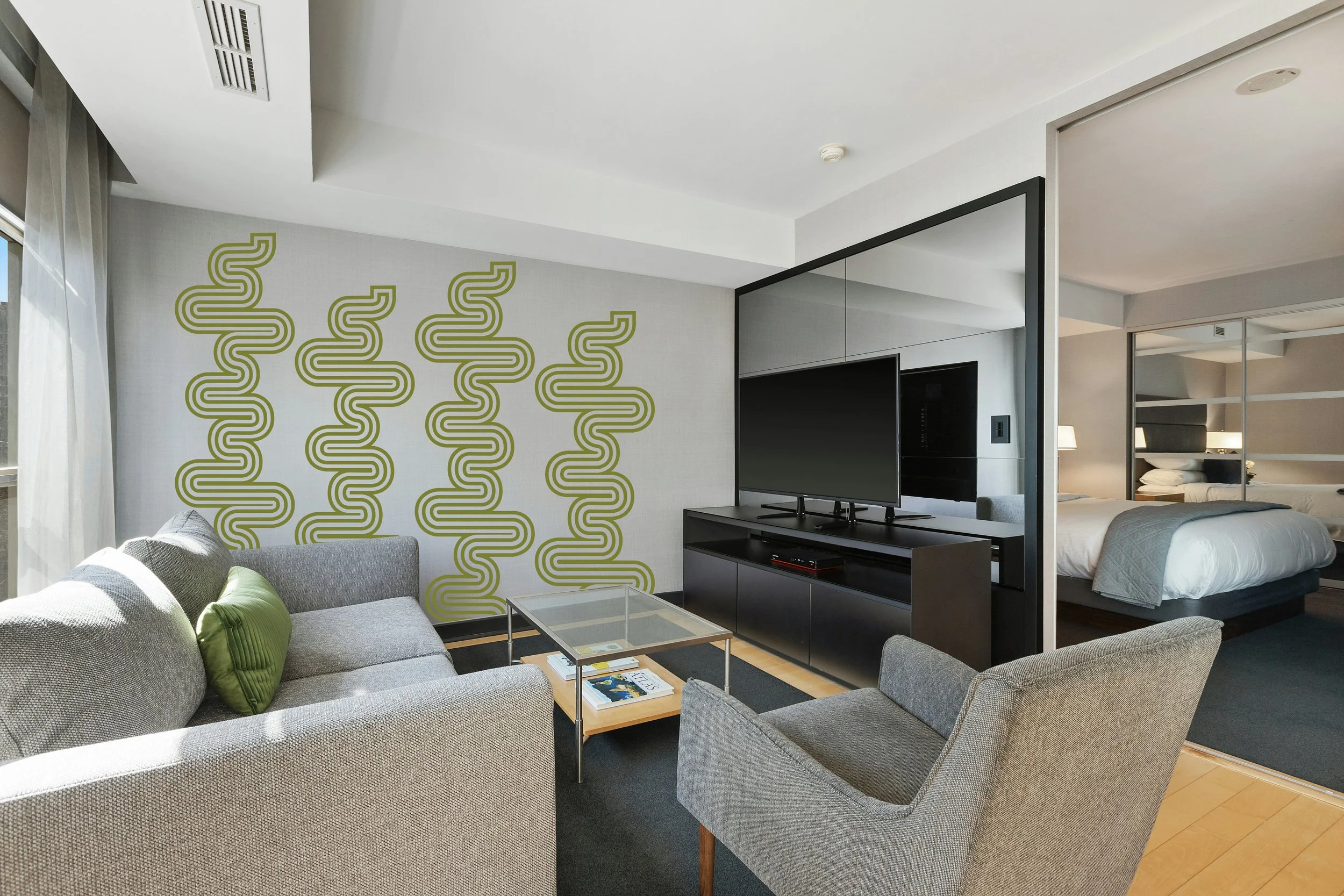 Olive maze-style curved line wall decal on neutral background.