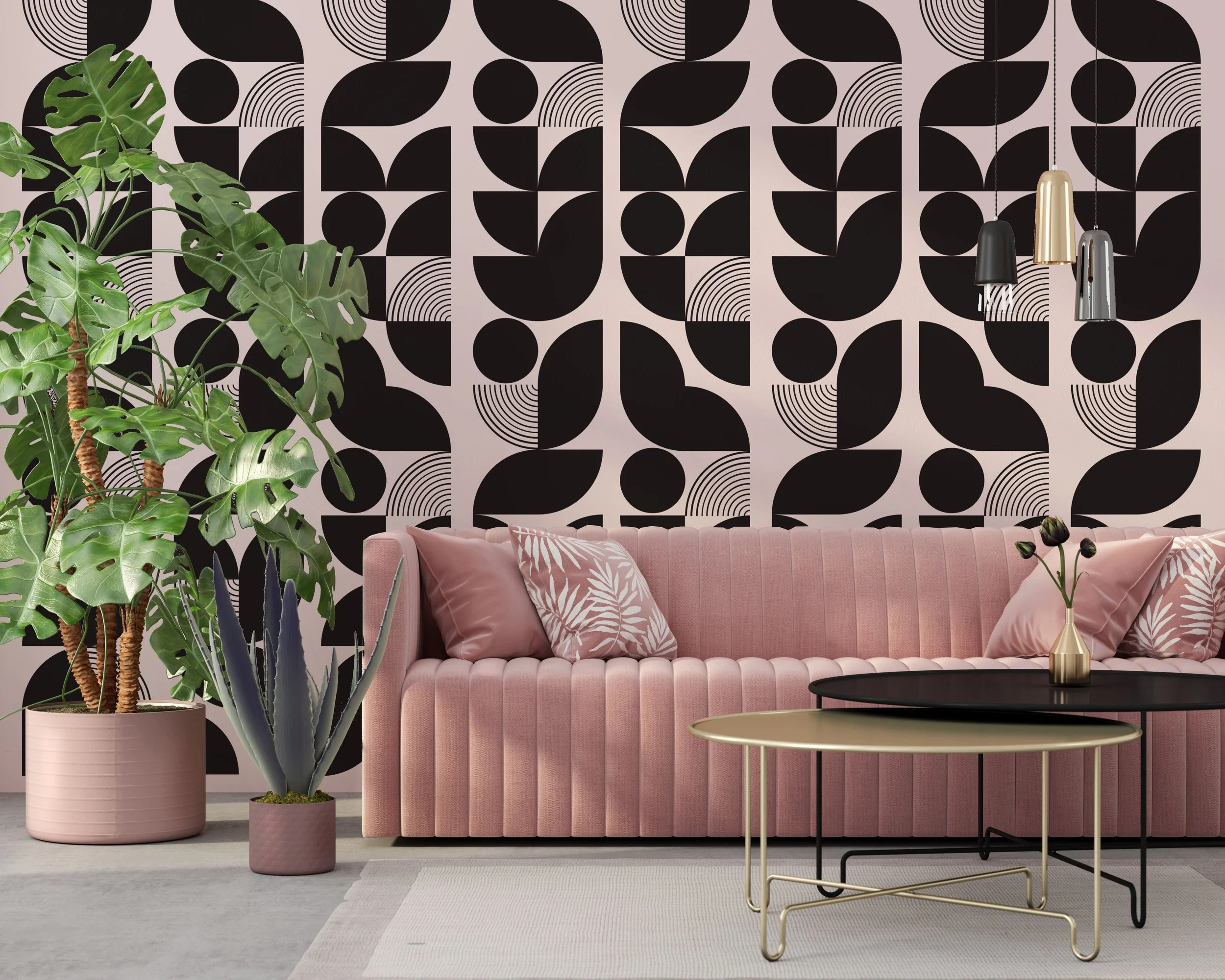Geometric wall decals by Wall Star Graphics in a pattern of retro solid and line shapes, shown in black on a light pink wall above a modern pink couch.