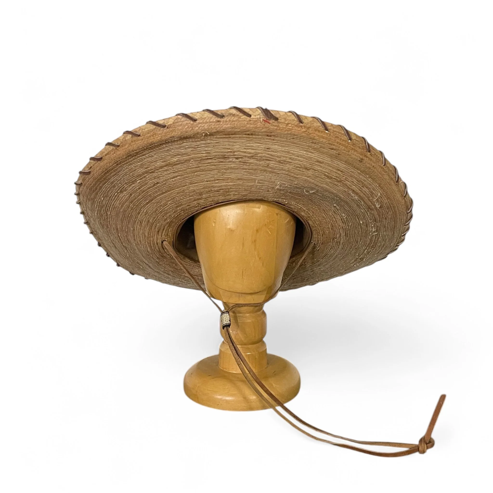 Vintage straw, palm leaf Sombrero Hat with leather whipstitch and chin strap. Authentic Mexican High Crowned, Doreman Burns artist.