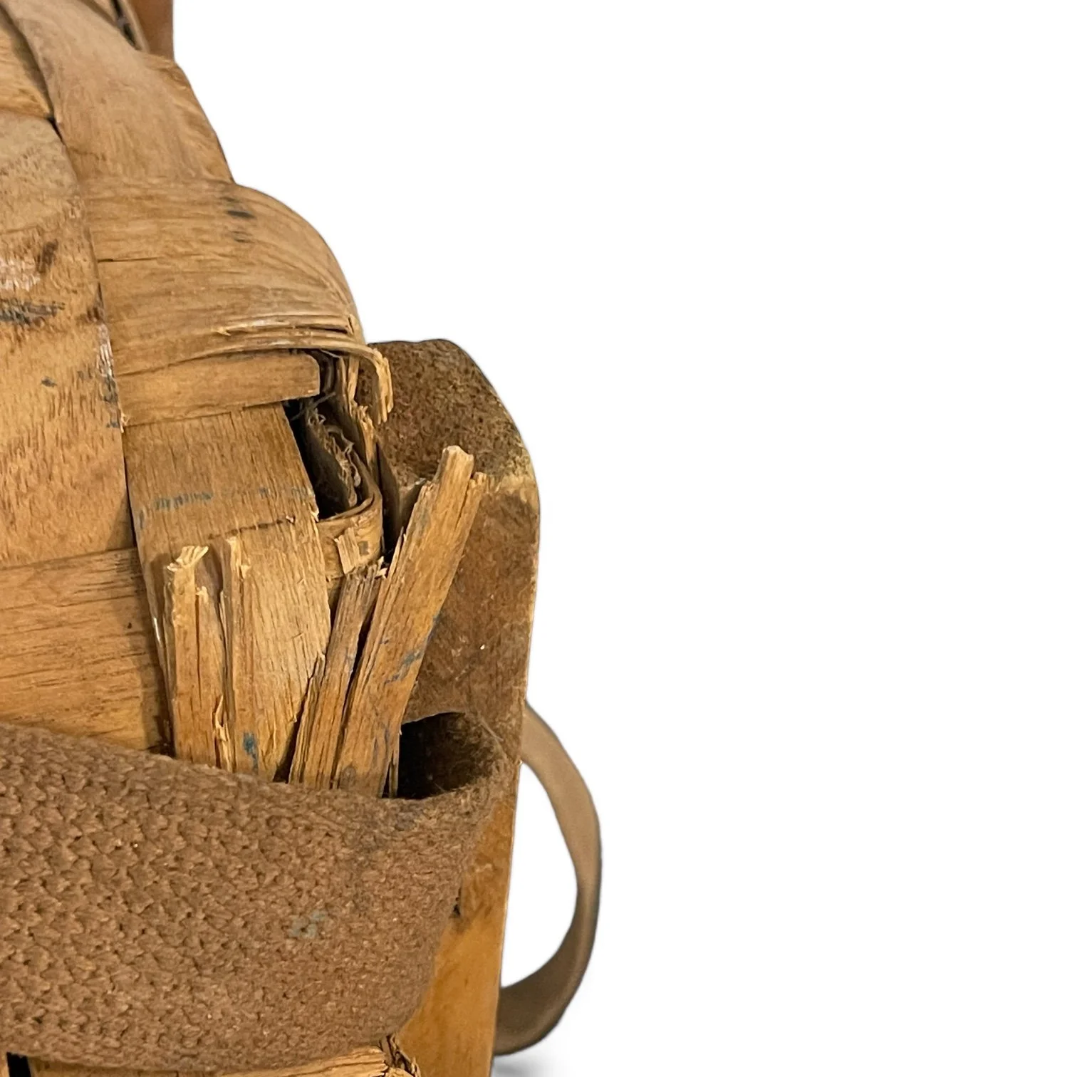 Close up view of a large vintage Adirondack Pack Basket - 2 Compartments, 1 with lid, canvas adjustable shoulder straps.