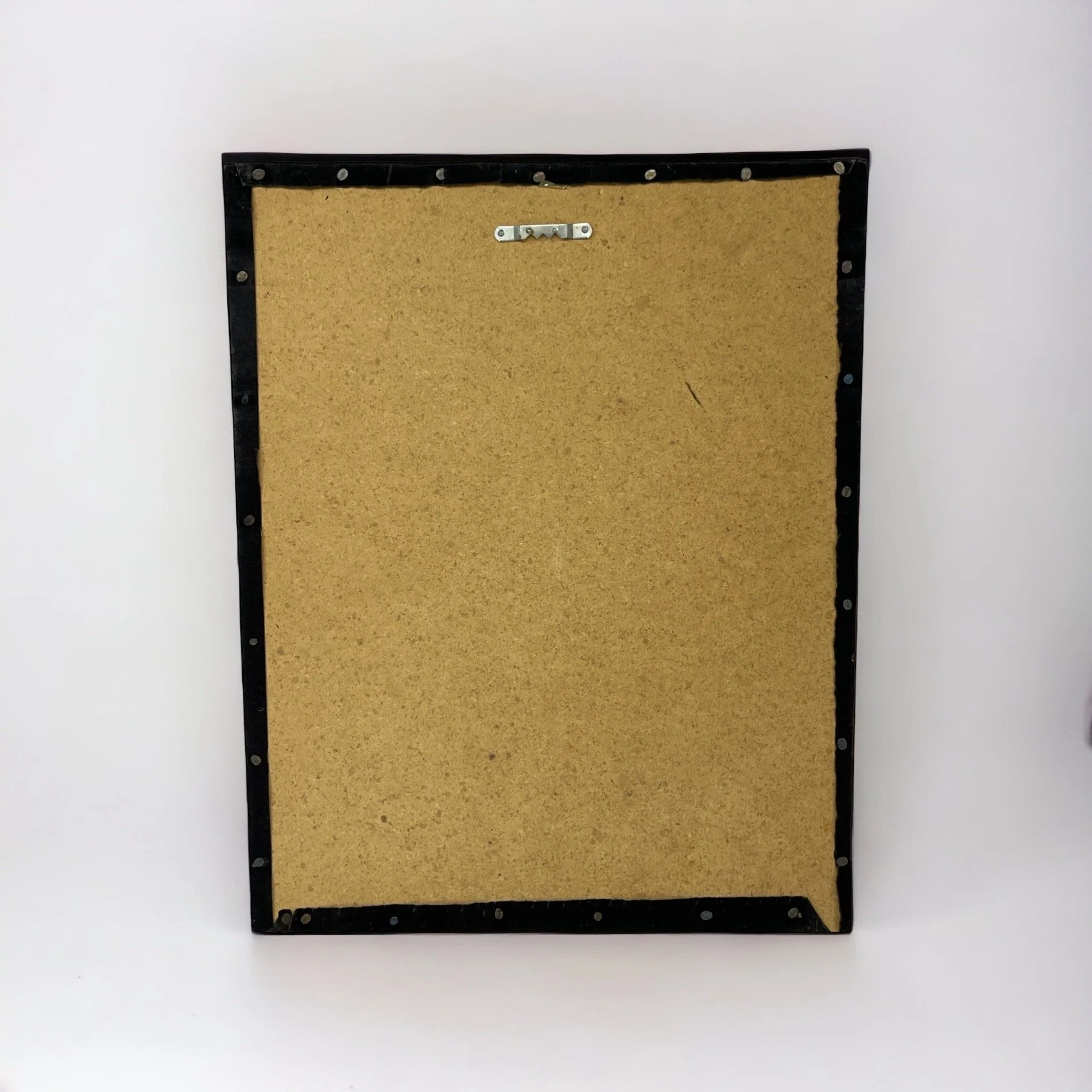 Back view of a vintage copper string art of a male deer, buck, on a black velvet board.