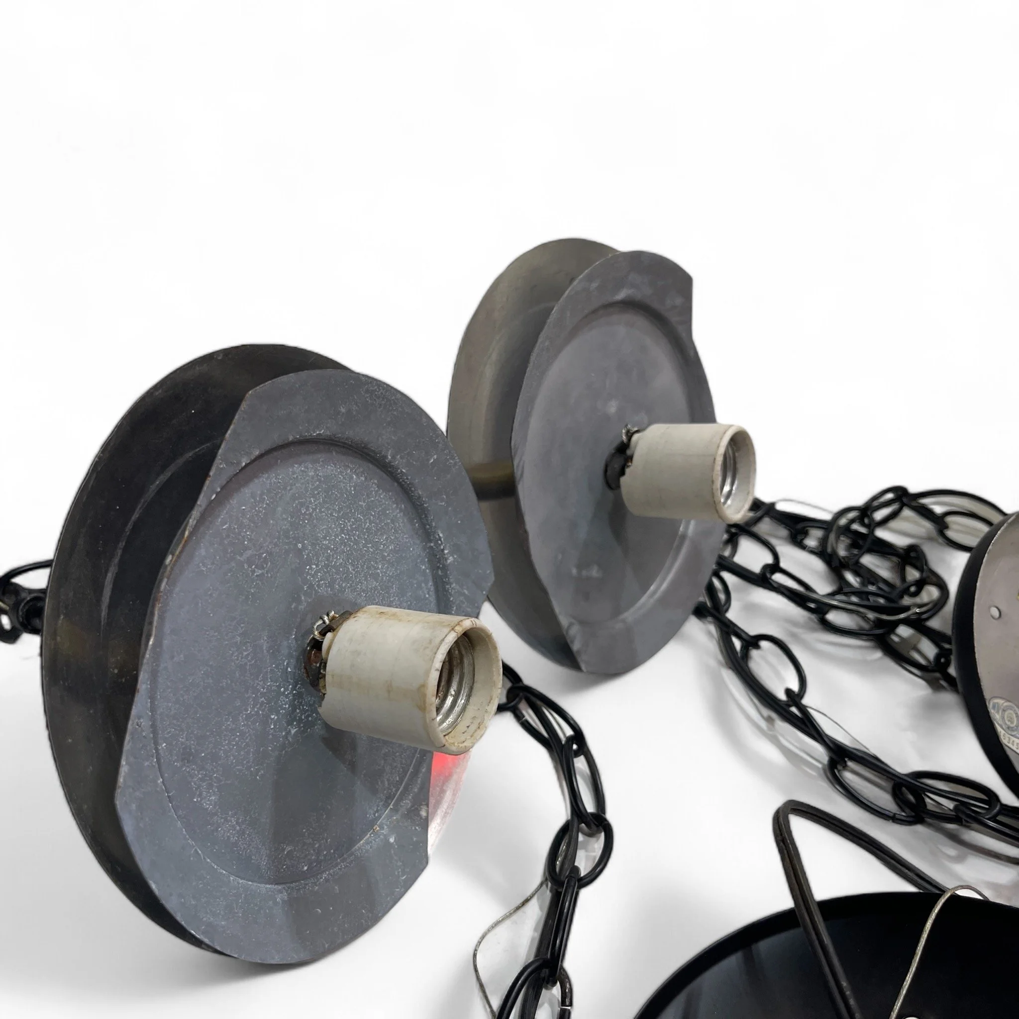 Pair of large 1960s white glass orb pendant swag hanging lights with black chain and finial, mid century modern design, perfect for vintage home decor or retro interior lighting.