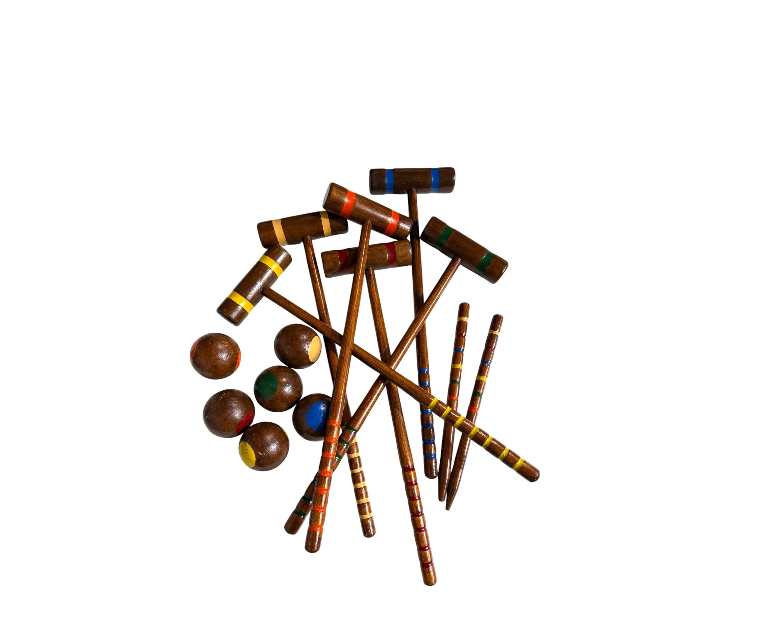 Vintage wooden croquet mallets with painted bands and wooden balls