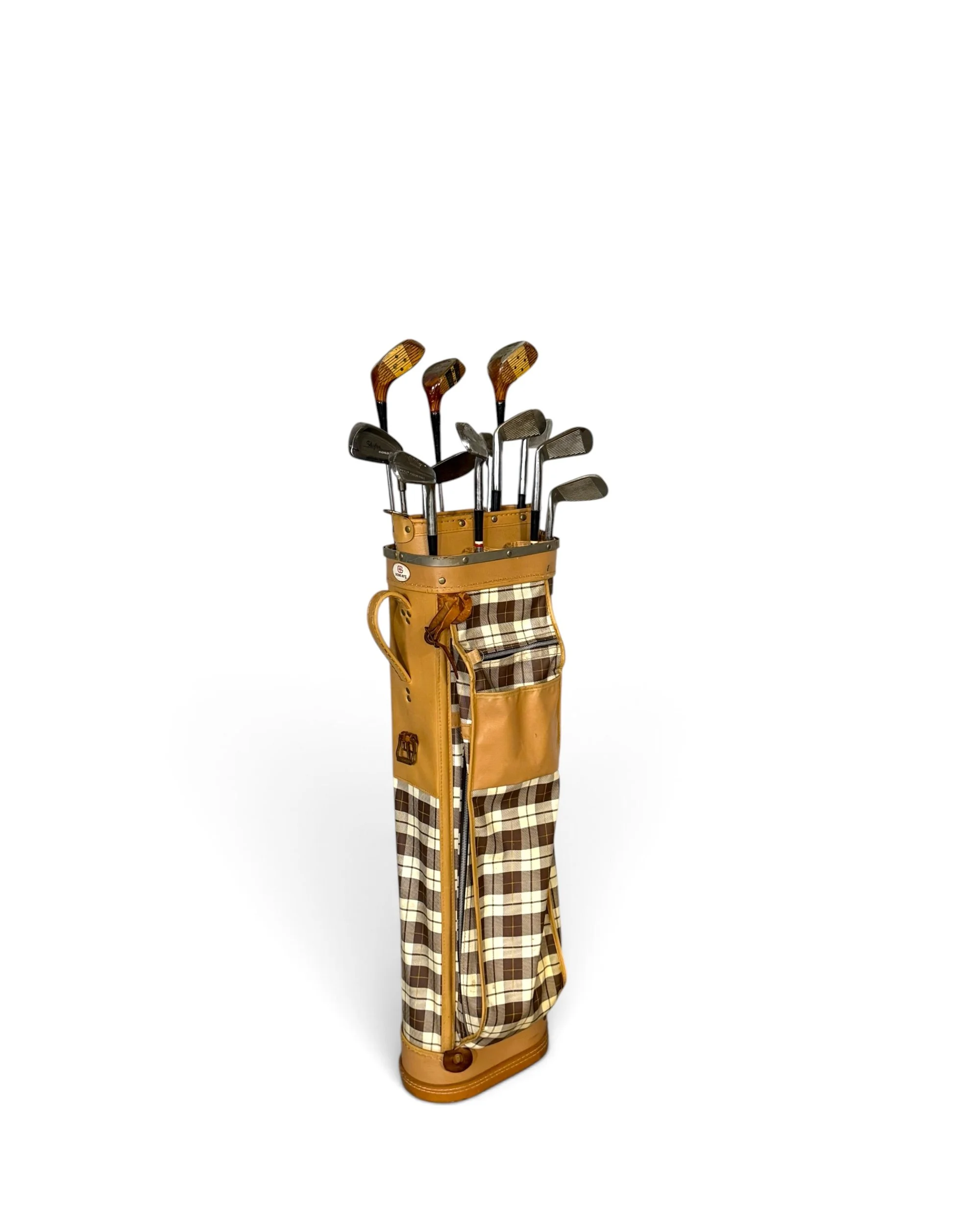 Vintage 1970s Score-Rite plaid golf bag by General Tire with Patty Berg Professional wood clubs and vintage irons displayed upright against a white background.