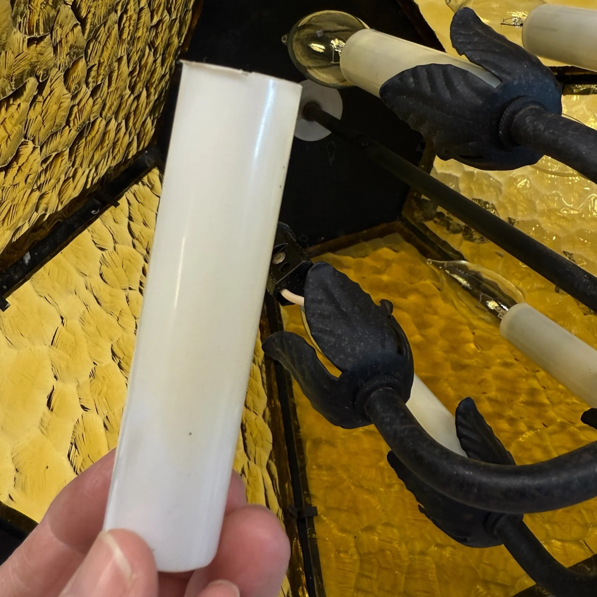 Vintage Spanish Revival wrought iron and amber glass hanging swag lamp.