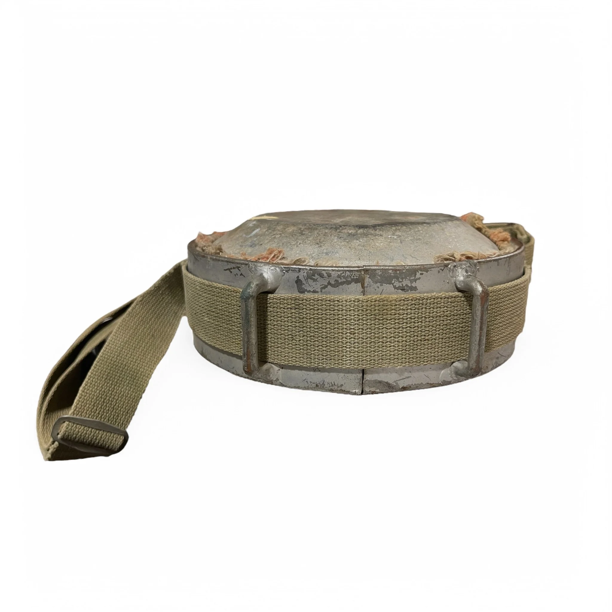 Vintage blanket and galvanized metal canteen with adjustable canvas strap, for rustic decor use.