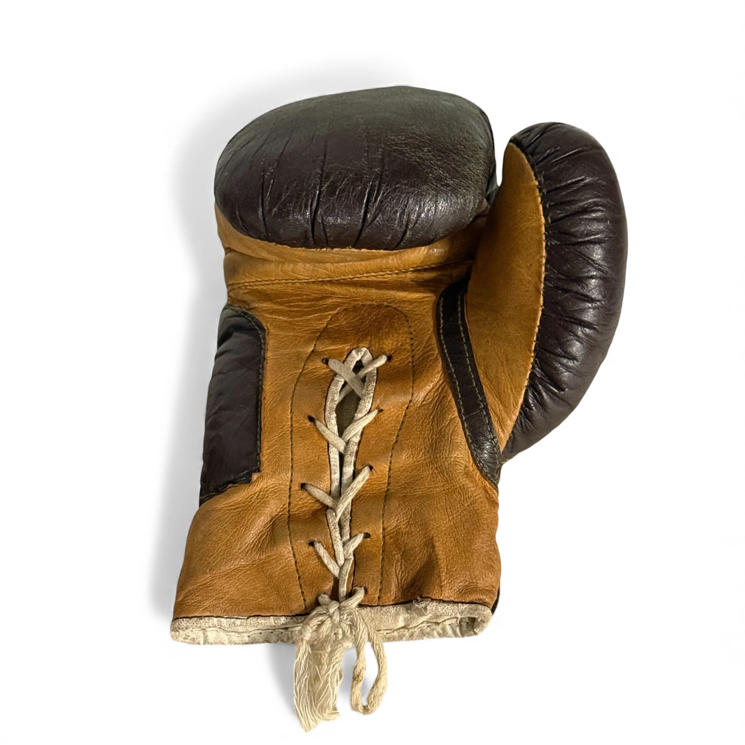 Detailed texture of aged leather boxing gloves