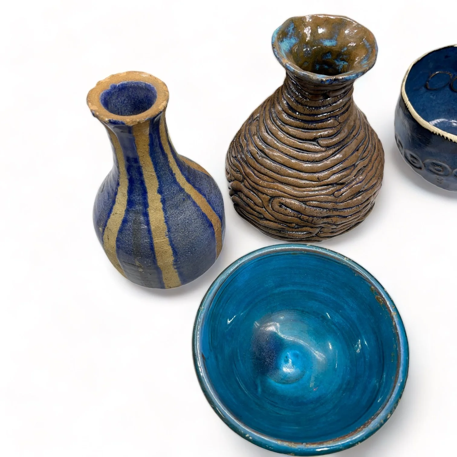 Vintage 7 piece handmade studio pottery collection of vases, bowls, mug in blue, turquoise and brown.