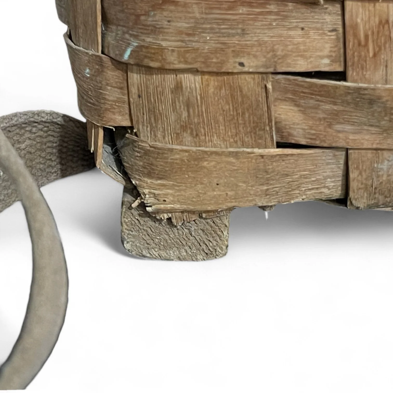 Close up view of a large vintage Adirondack Pack Basket - 2 Compartments, 1 with lid, canvas adjustable shoulder straps.