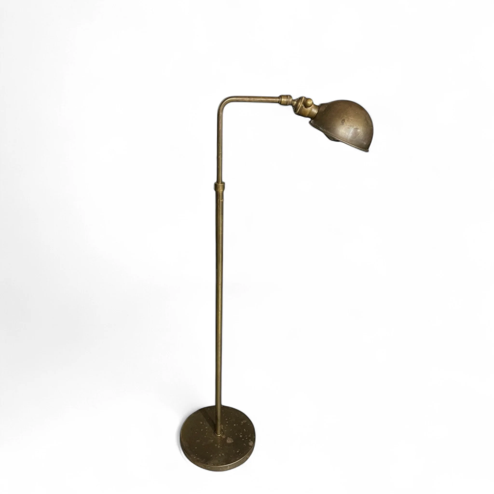 Vintage Chapman style brass pharmacy floor lamp, height fully adjustable, articulating round shade, round weighted base, circa 1960s.
