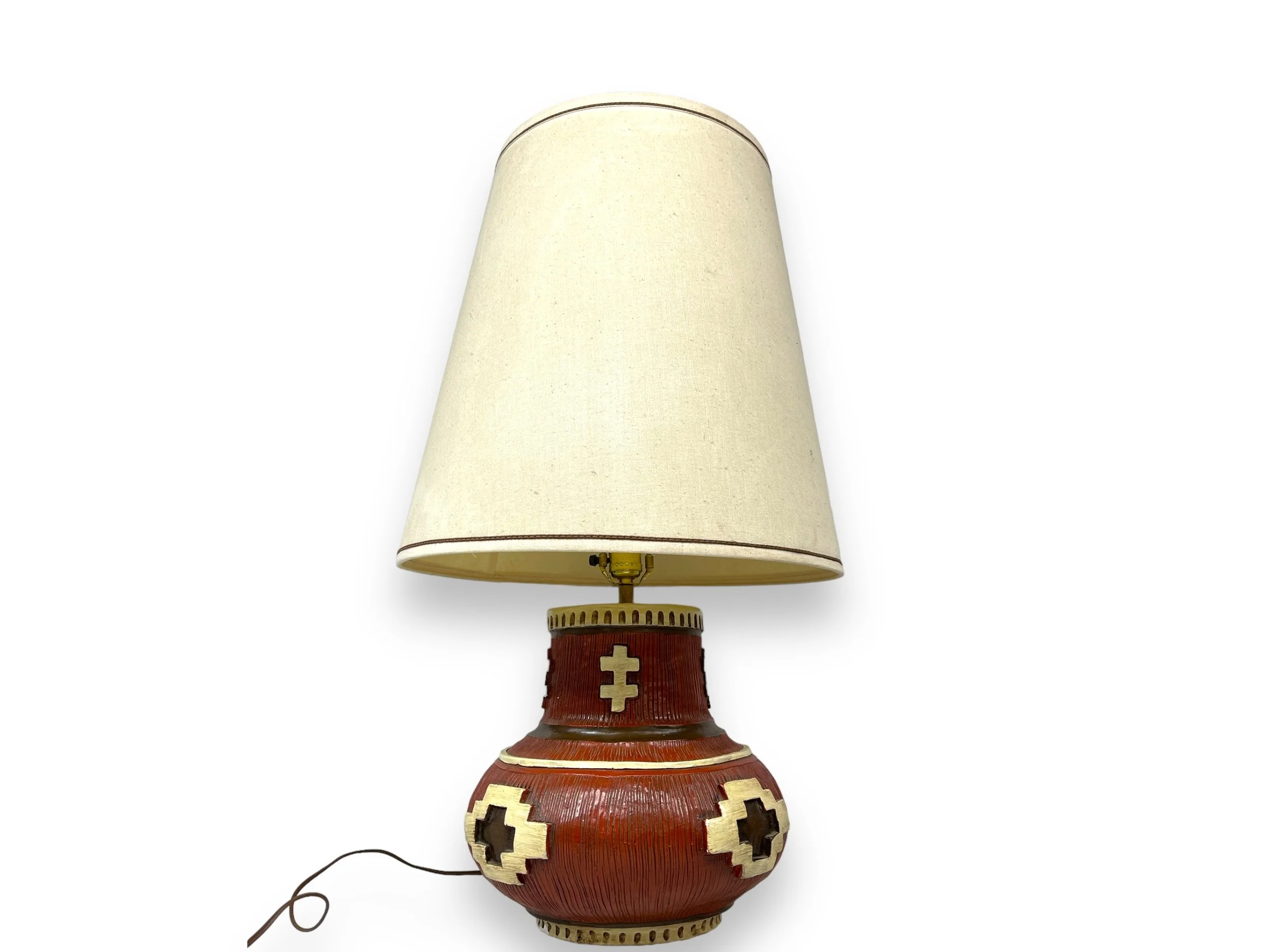 Vintage 31 inch tall ceramic table lamp with shade by American Lamp Co., featuring a southwestern geometric pattern in earth tone colors.