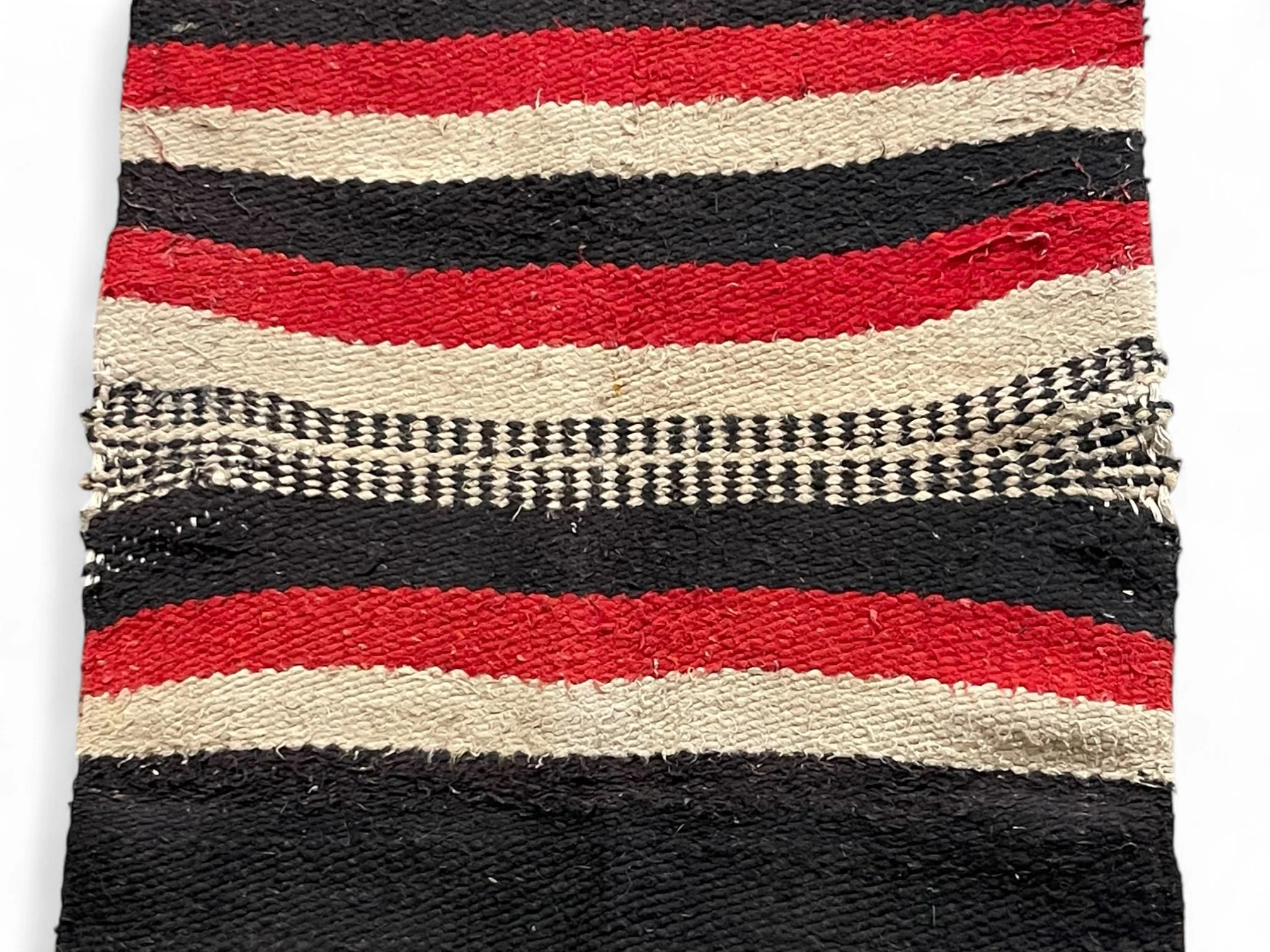 Vintage 31x64 inch Artesanias Rya throw rug, textile, striped horse blanket in solid black with red, beige, black stripes.