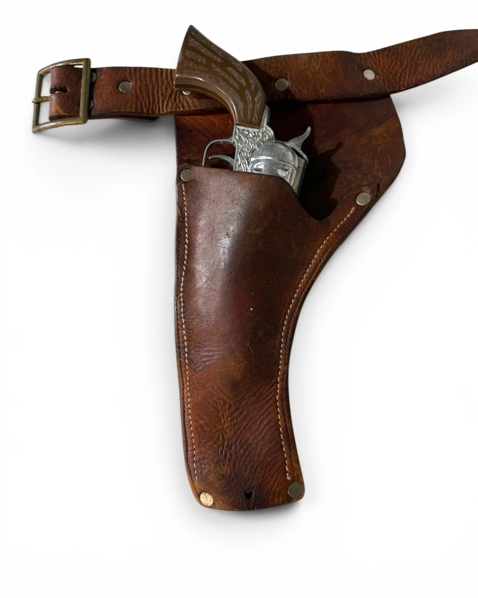 Photoroom_20260609_190338vintage toy guns with leather holster - Modern Artifact Decor.JPG