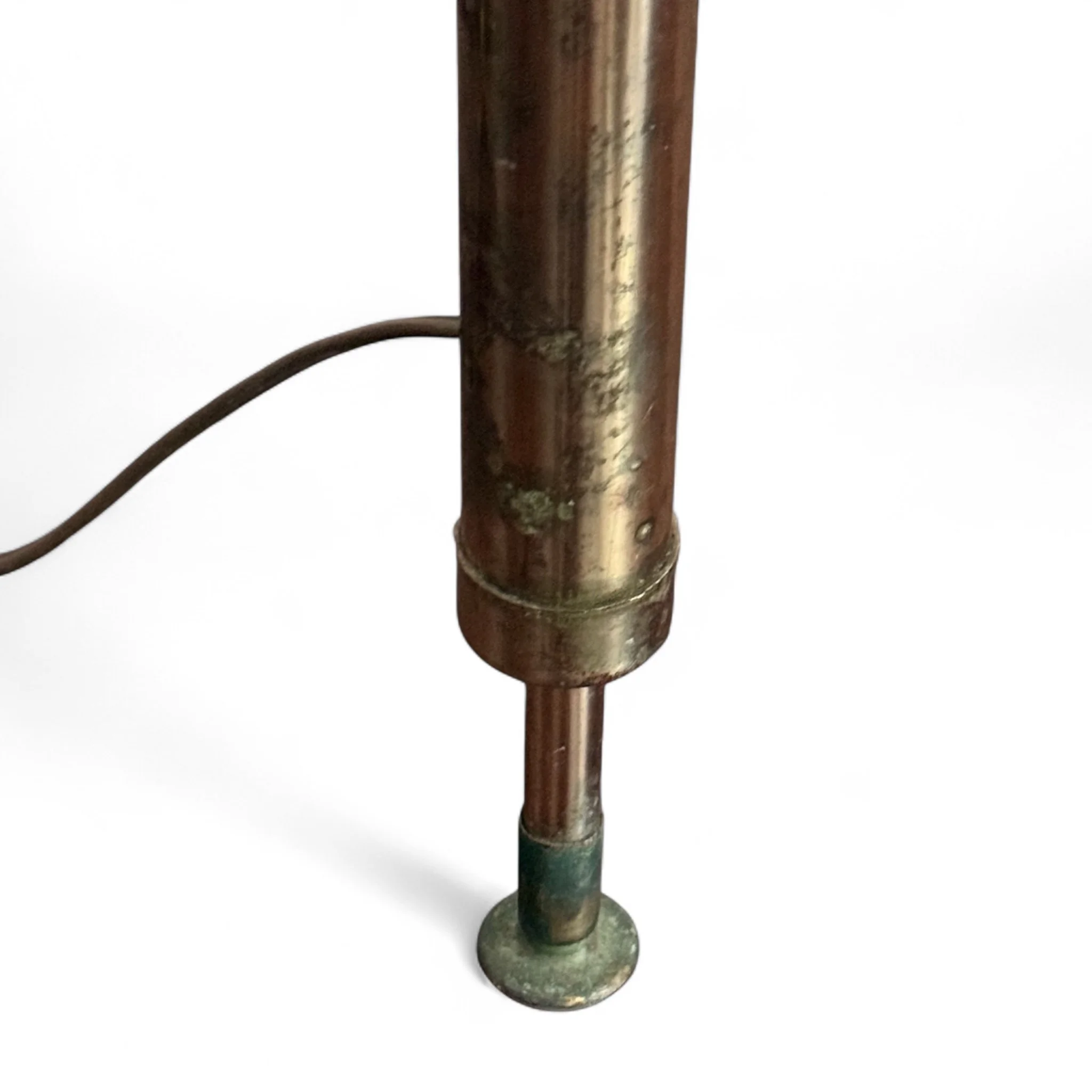 Detail of wood and metal pole on retro mid century modern floor lamp