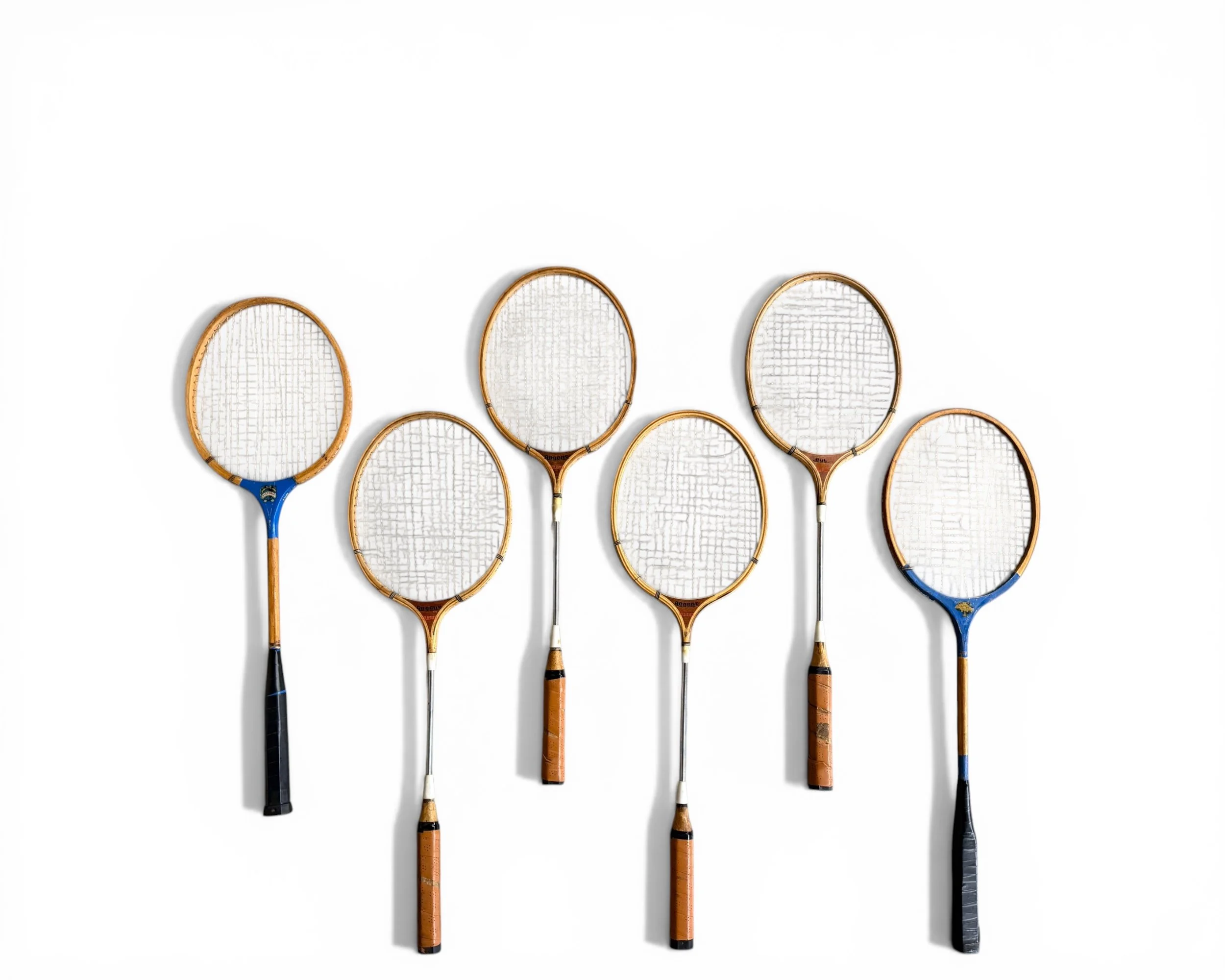 Set of 6 vintage wooden badminton rackets arranged for wall decor