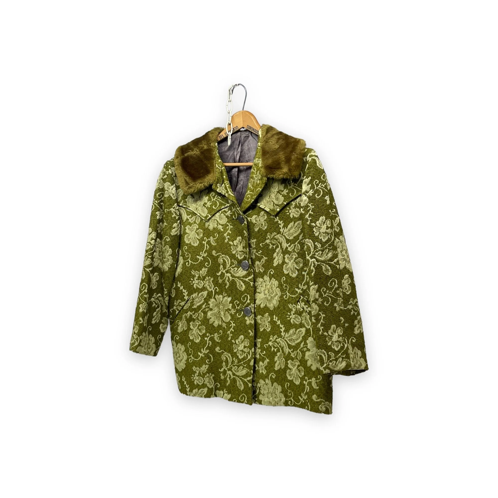 Vintage 1960s women's Westwear jacket in green floral tapestry, classic ranch style with button front closure, fully lined, front pockets, and western yoke detailing.