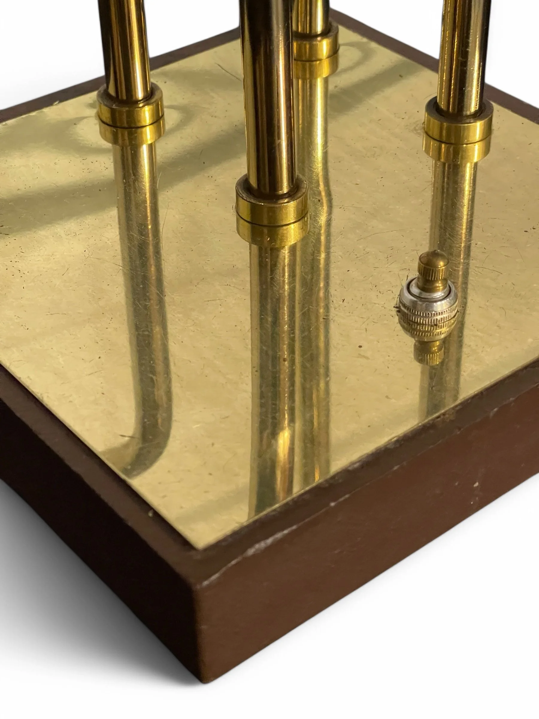 Vintage brass mid century modern 4 pivoting head table lamp  on a square wood and brass base by Clover Lamp Co.