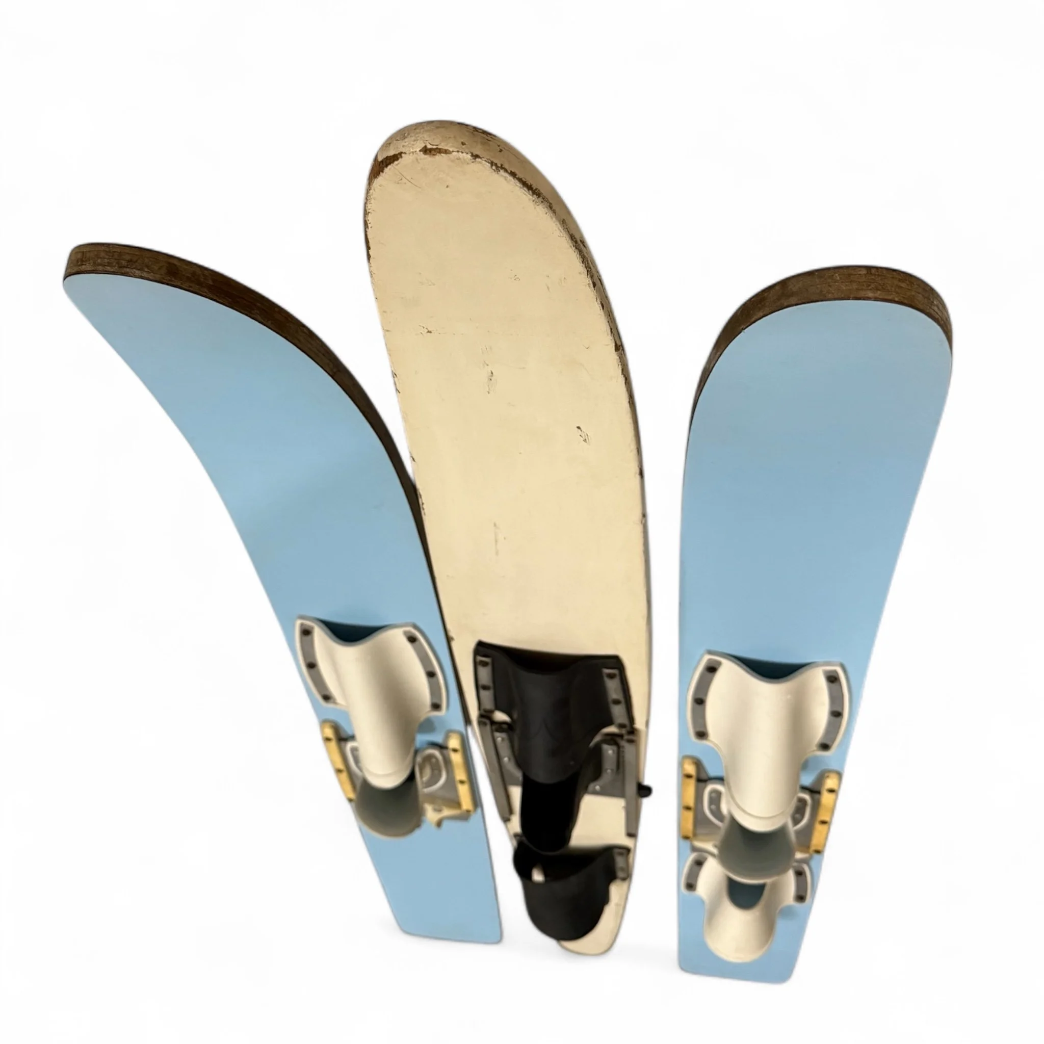 Set of 3 vintage kids wooden water skis, powder blue and white, perfect for nautical or coastal themed interiors.