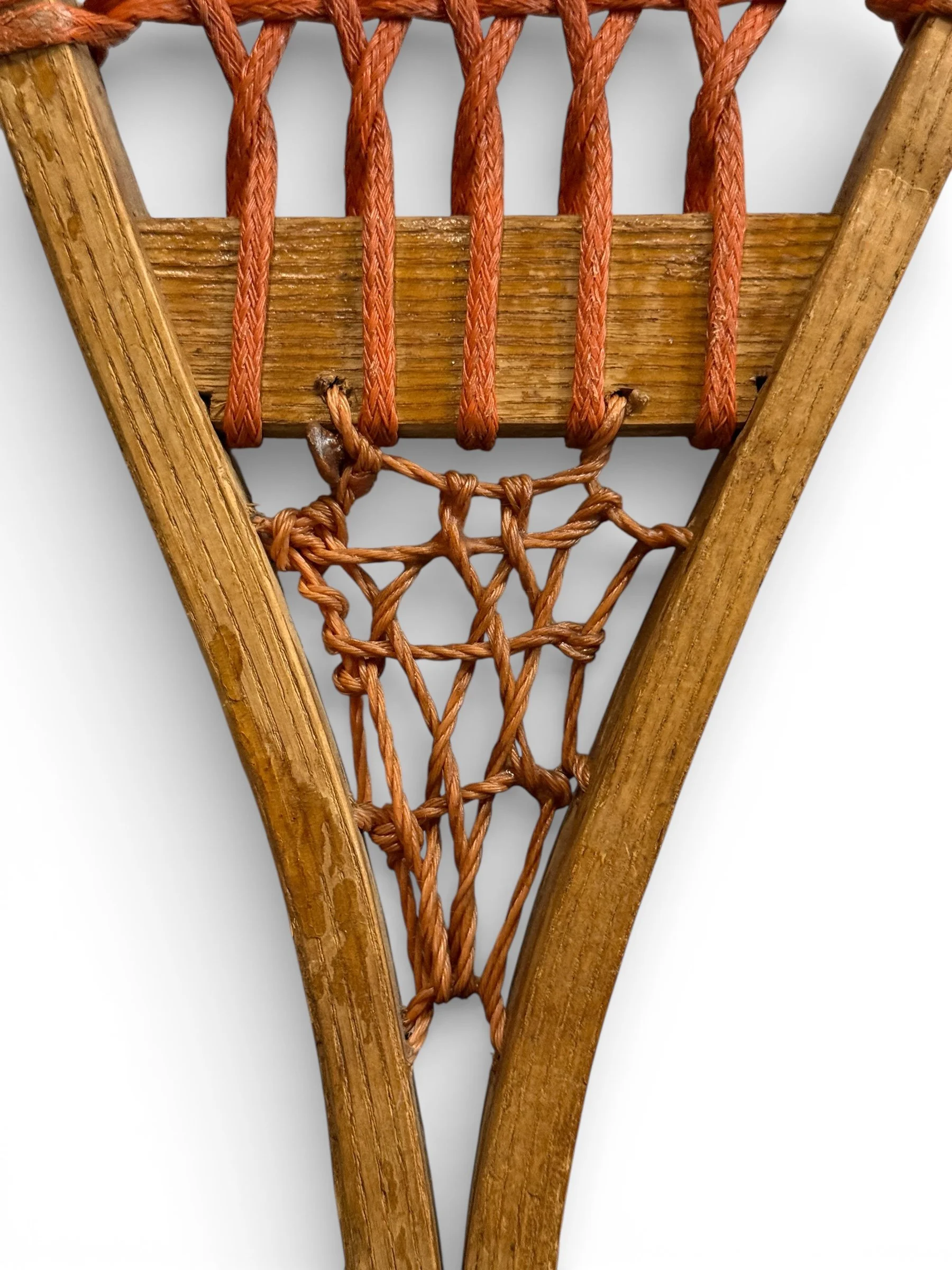 close up web details on vintage wooden snowshoes