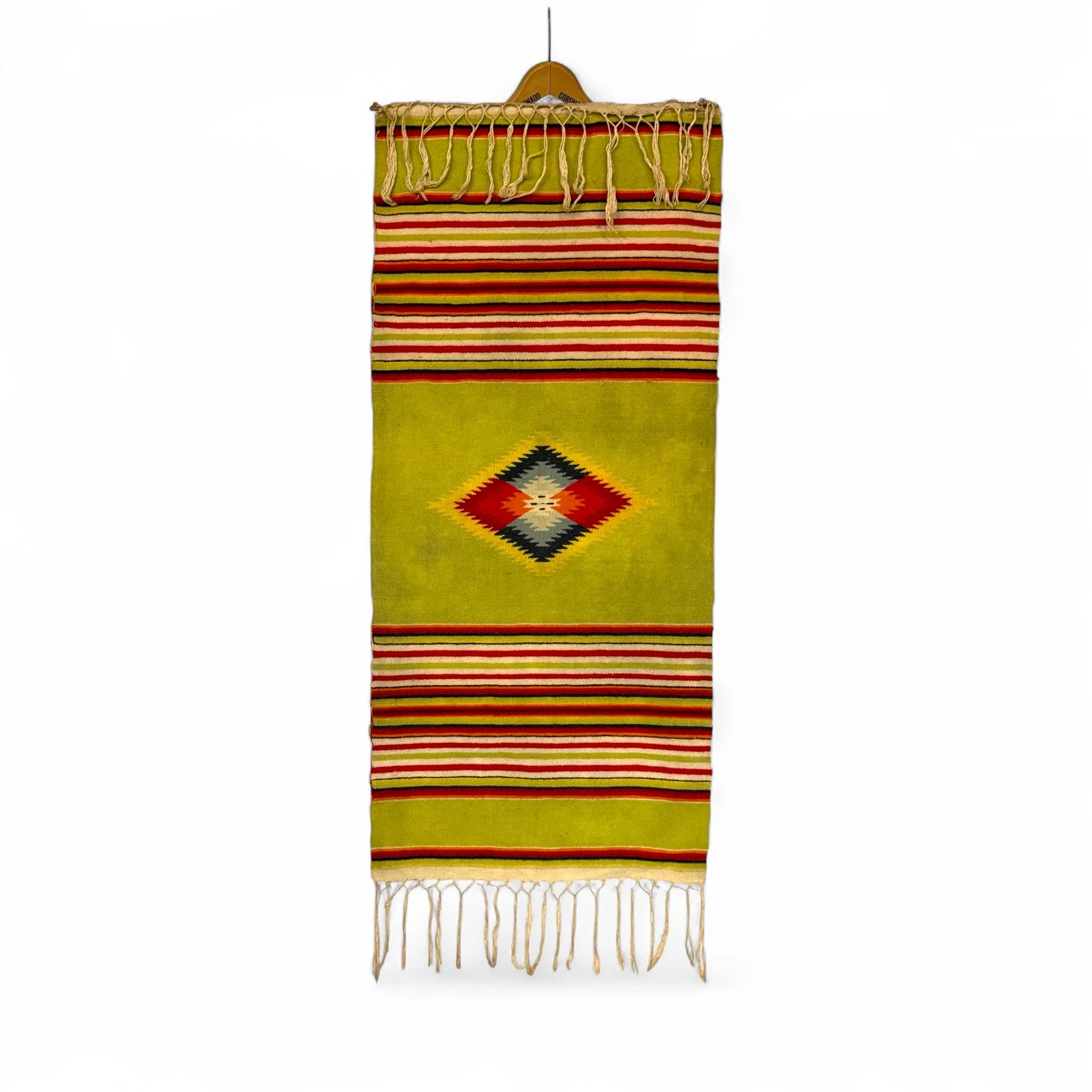 Vintage Mexican textile wall hanging in colorful hues, Southwestern style.
