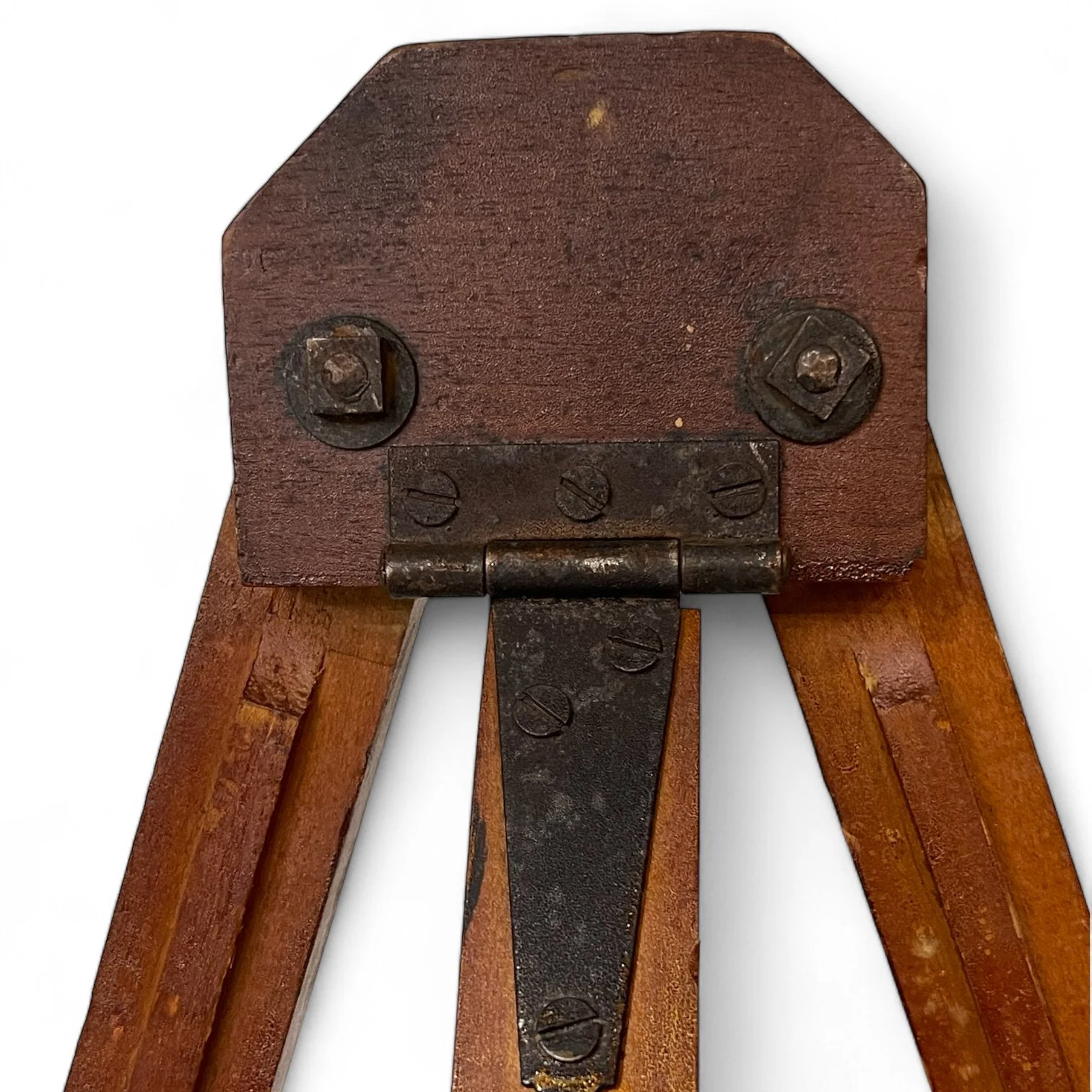 A vintage wooden adjustable floor easel.