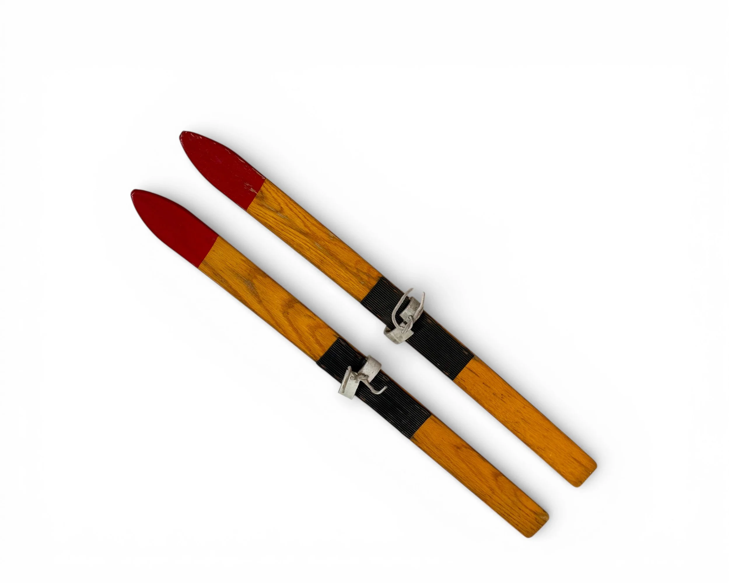 Pair of vintage wooden kids snow skis for rustic cabin decor