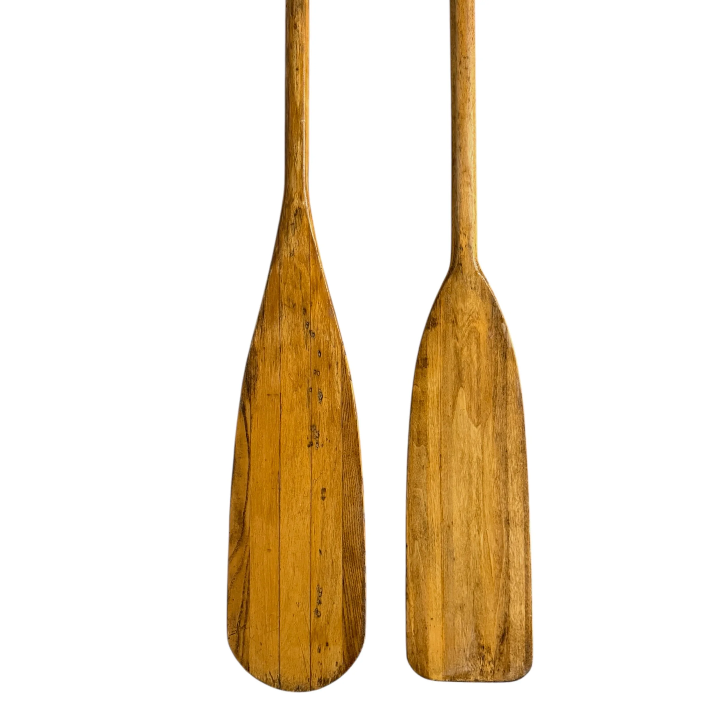 Close up paddle view detailing wood grain on vintage boat oars