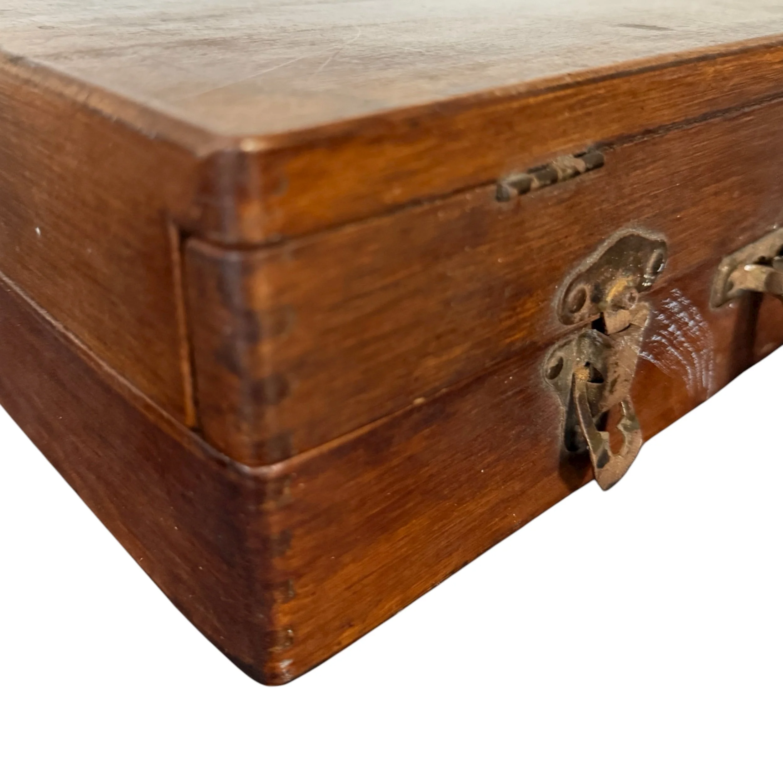 Side view of wooden artist supply storage box with metal hardware.