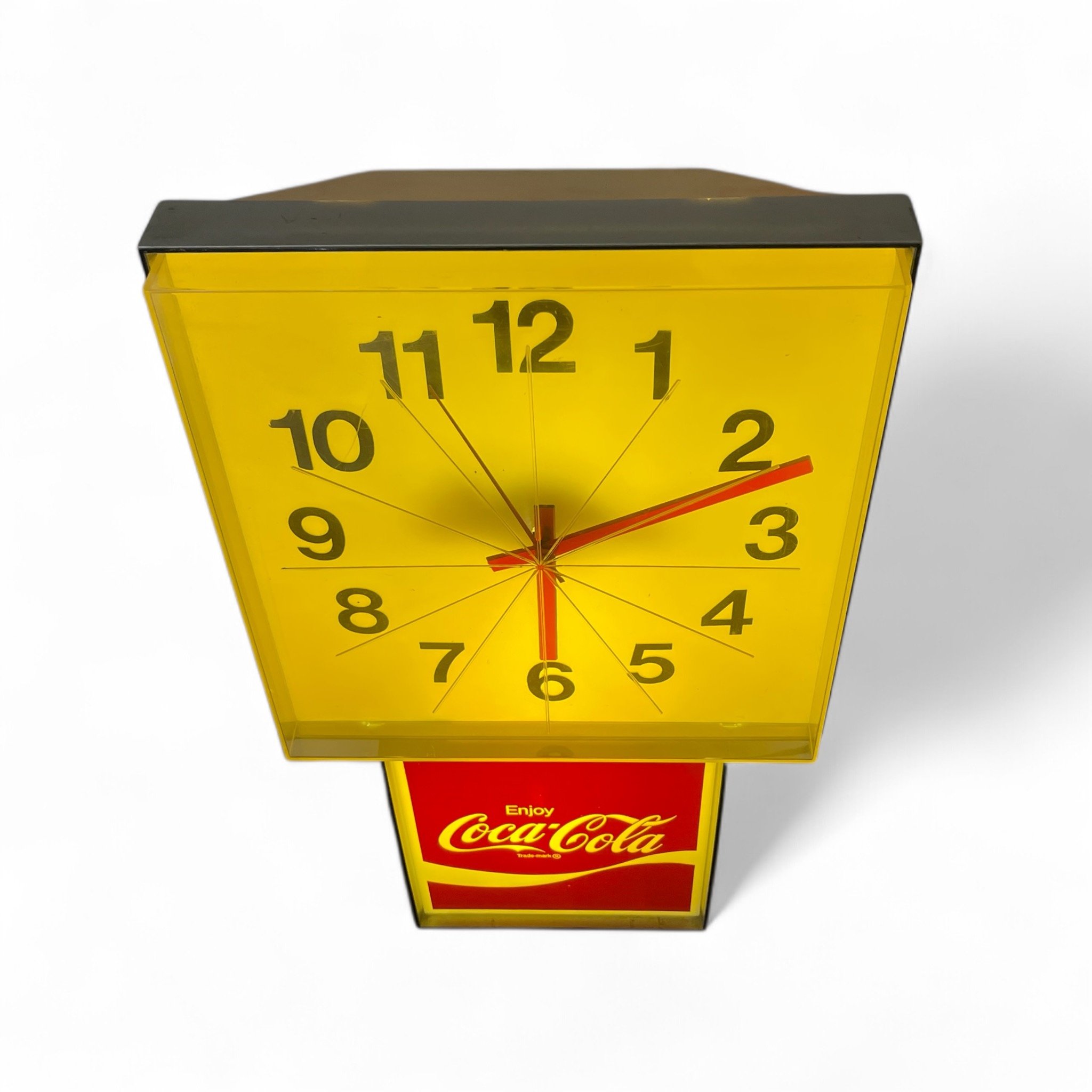 Vintage 1970s Coca-Cola light up sign with clock, square shapes, in working condition. Features retro design, perfect for soda memorabilia collectors and restaurant, bar, or game room decor.