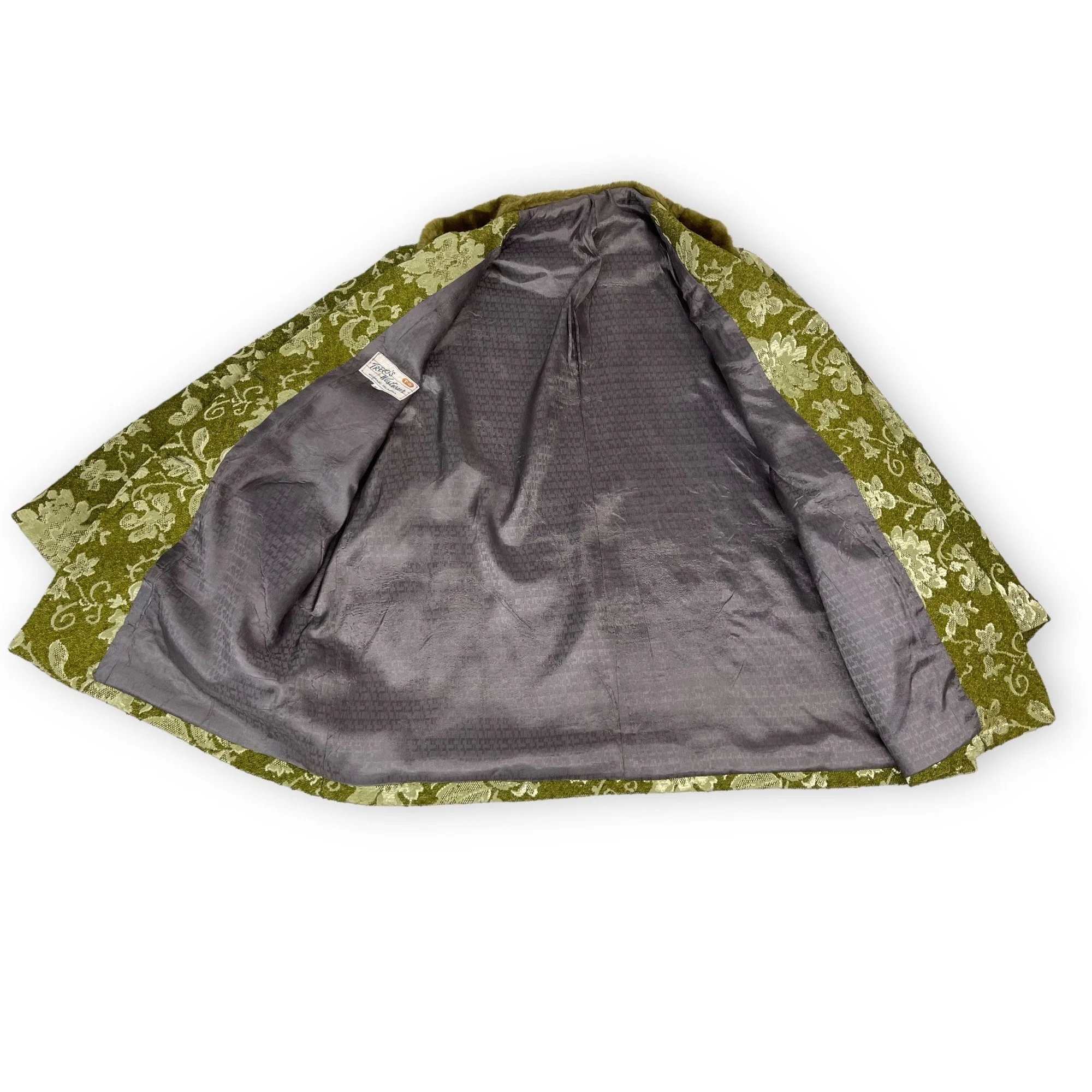 Vintage 1960s women's Westwear jacket in green floral tapestry, classic ranch style with button front closure, fully lined, front pockets, and western yoke detailing.