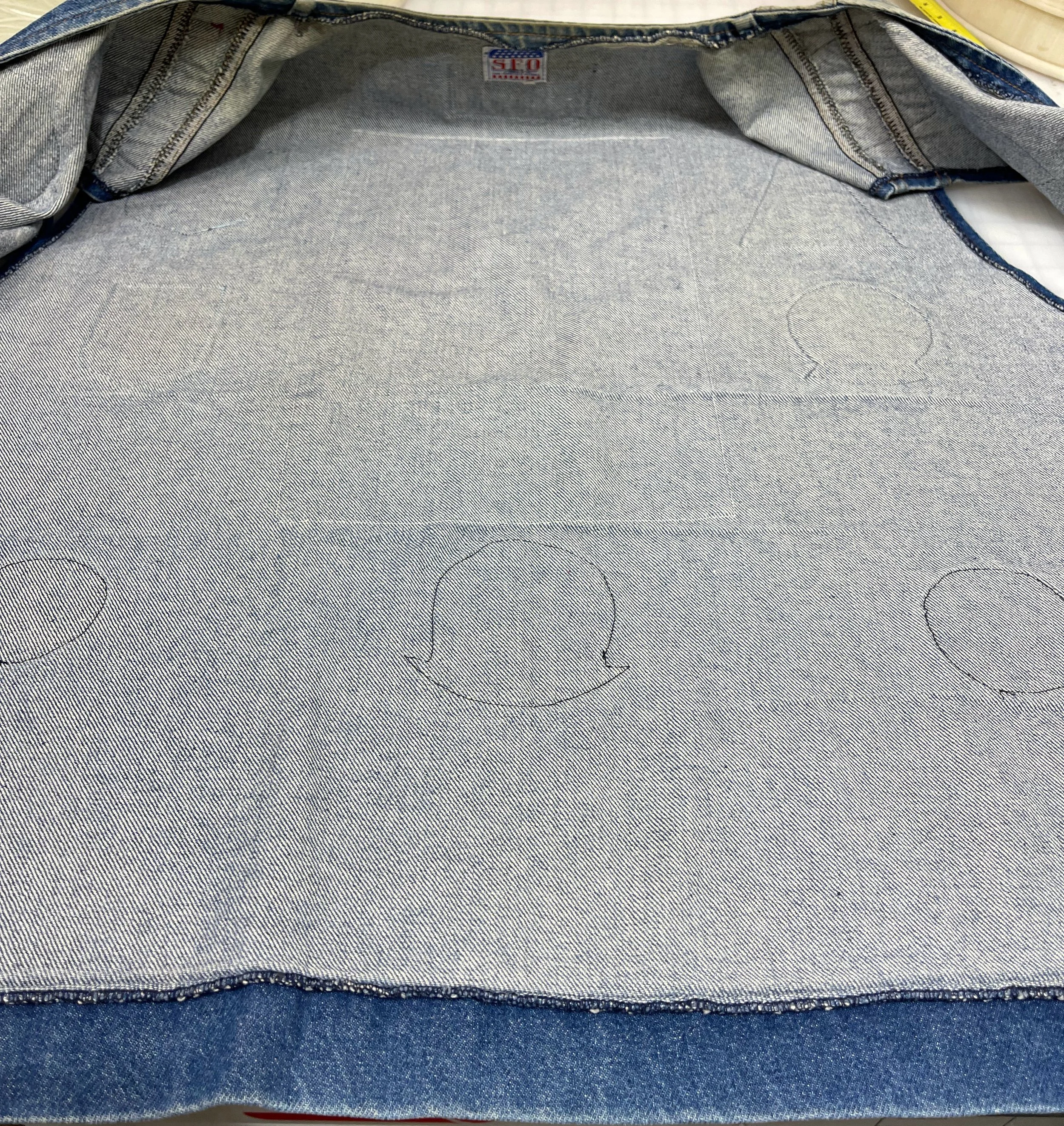 Vintage mens 3XL or 4XL denim vest by SFO San Francisco Overall with vintage military patches.