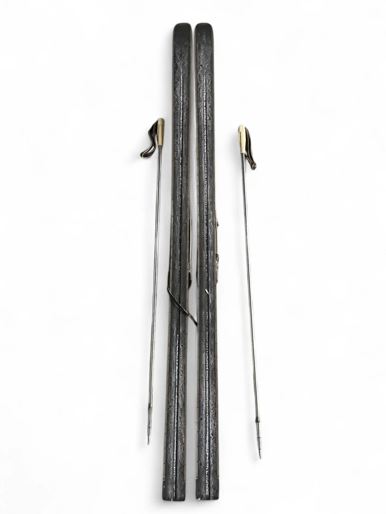 Vintage pair Paris wooden snow skis with metal poles with bakelite handles, leather straps, 80 inches, rustic cabin and lodge style.