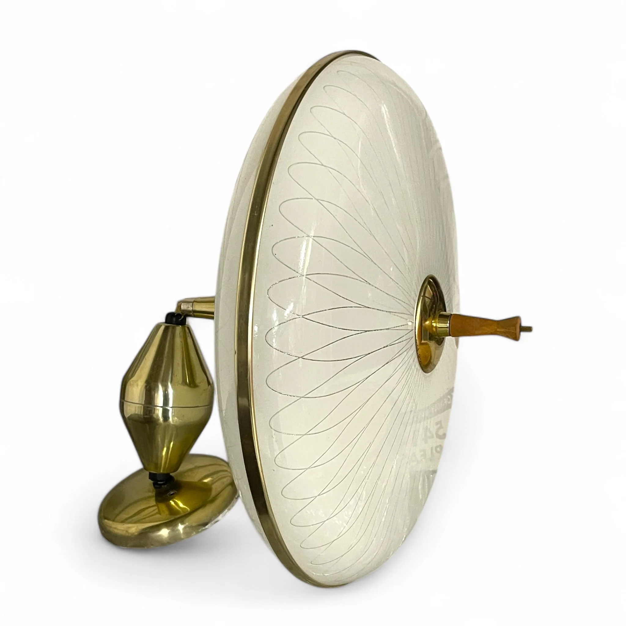 Close up of a vintage glass atomic saucer hanging ceiling light with 3 light sockets, showcasing its mid century modern design and sleek glass shade, perfect for retro and modernism decor.