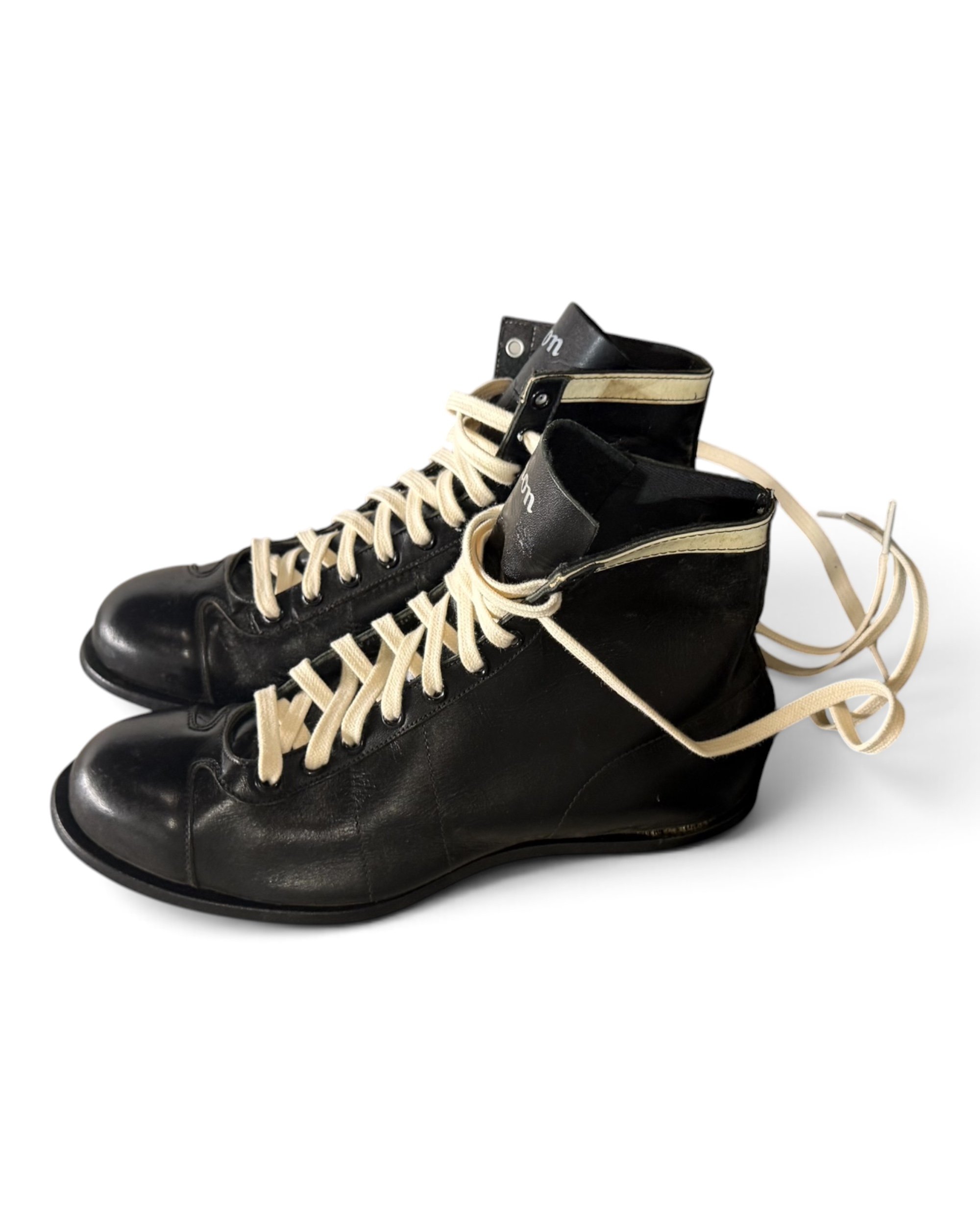 vintage black leather football cleats by Wilson NOS - Modern Artifact DecorPhotoroom_20260815_175228.JPG