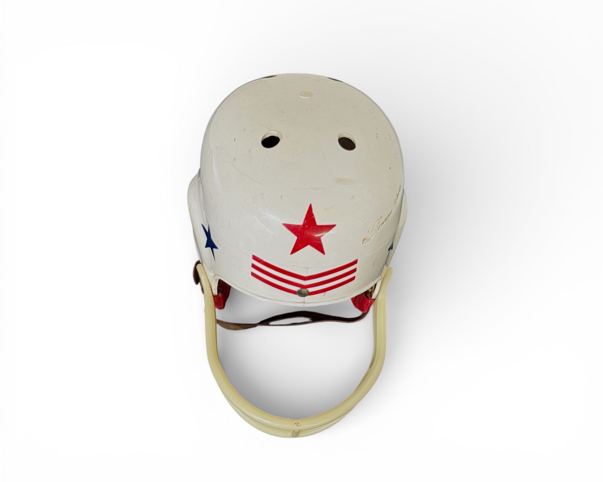 Top view of vintage mid century youth football helmet, red white blue, patriotic kids bedroom decor