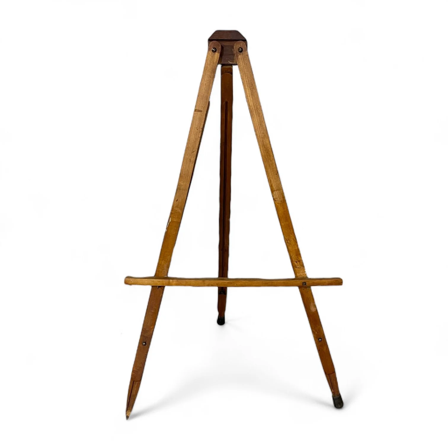 A vintage wooden adjustable floor easel.