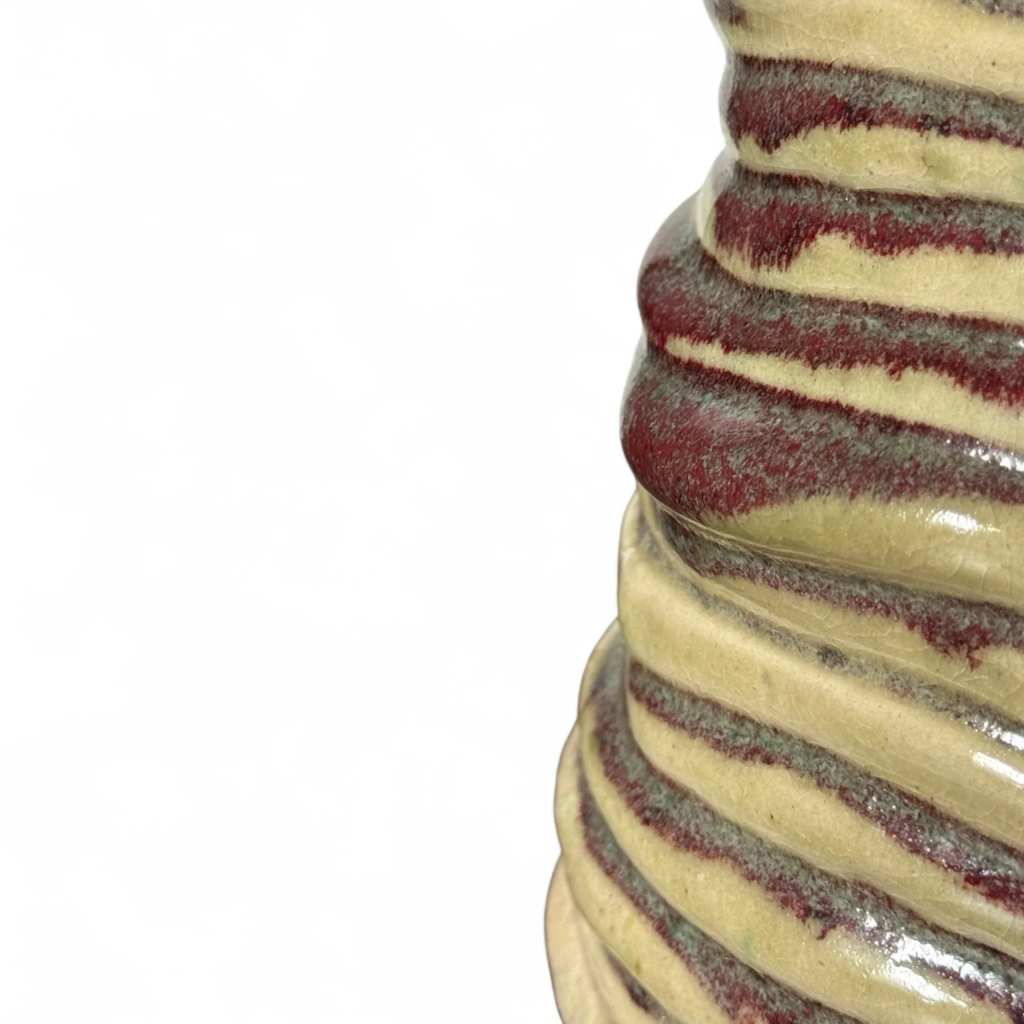 Vintage coiled clay ceramic vase with natural, organic, texted look, perfect for holding dried flowers in rustic, southwestern, or boho interiors.