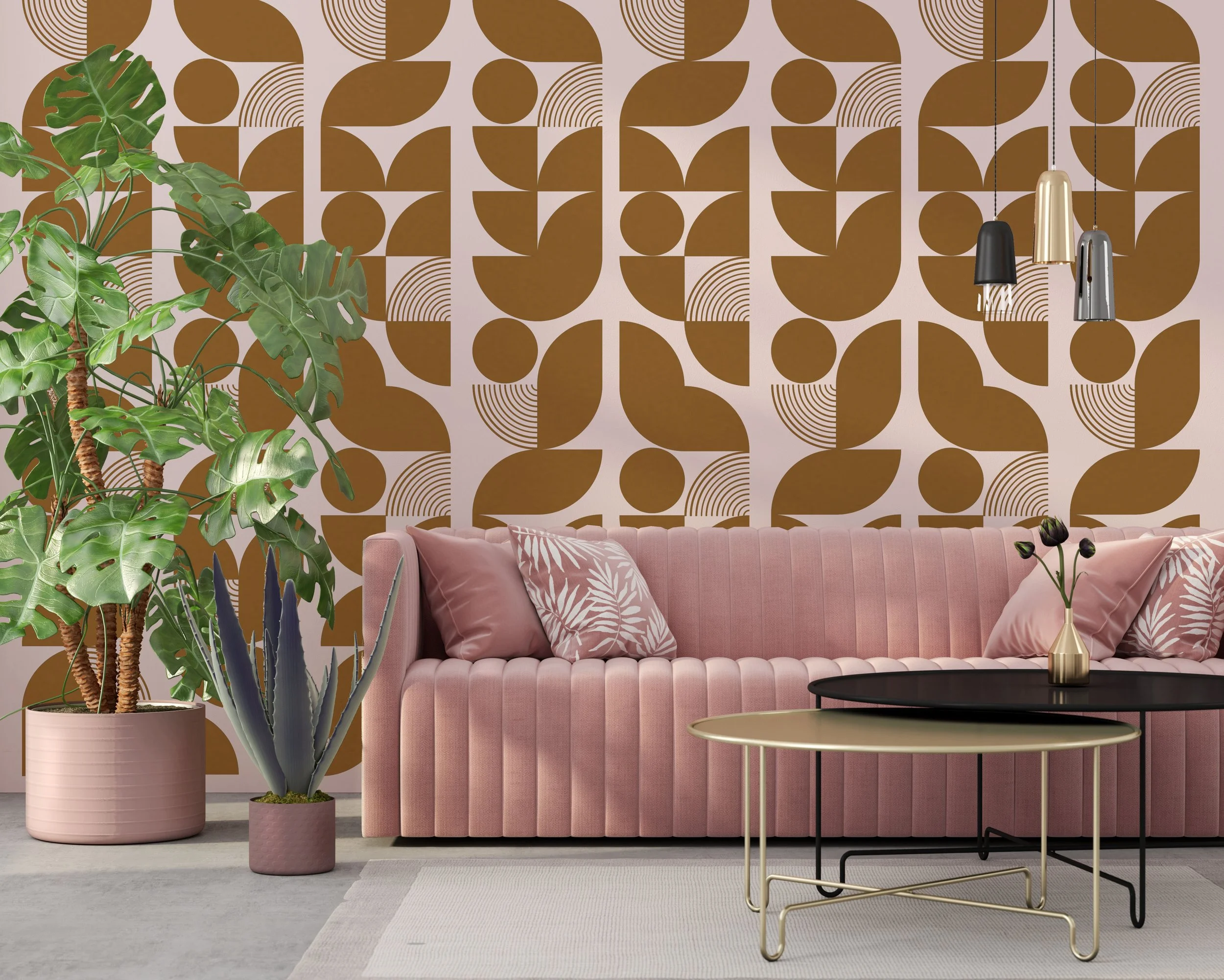Geometric wall decals by Wall Star Graphics in a pattern of retro solid and line shapes, shown in metallic gold on a light pink wall above a modern pink couch.