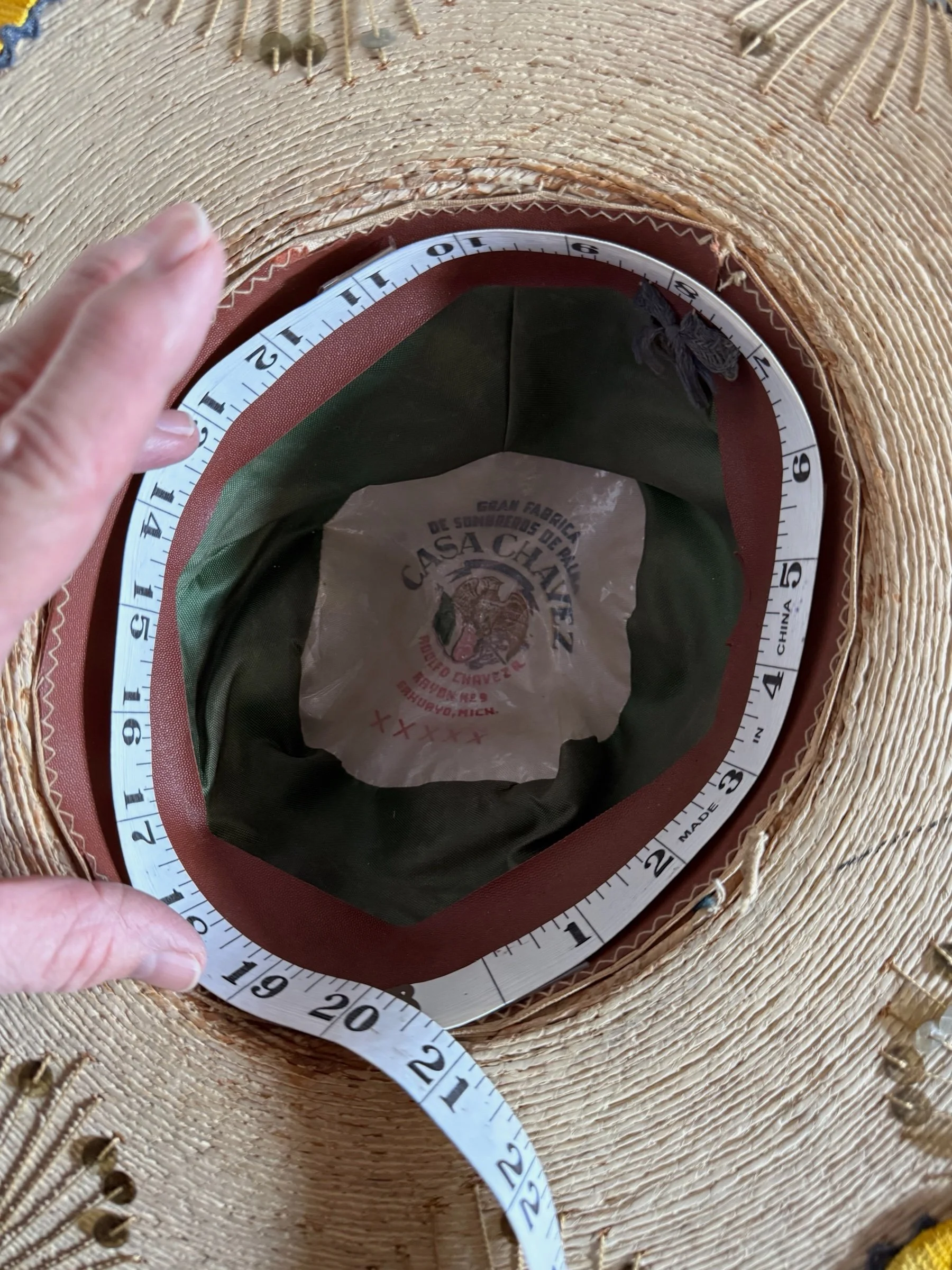 Interior label Casa Chavez Rodolfo Chavez Michoacán Mexico XXXXX marking with a tape measure showing 21" circumference