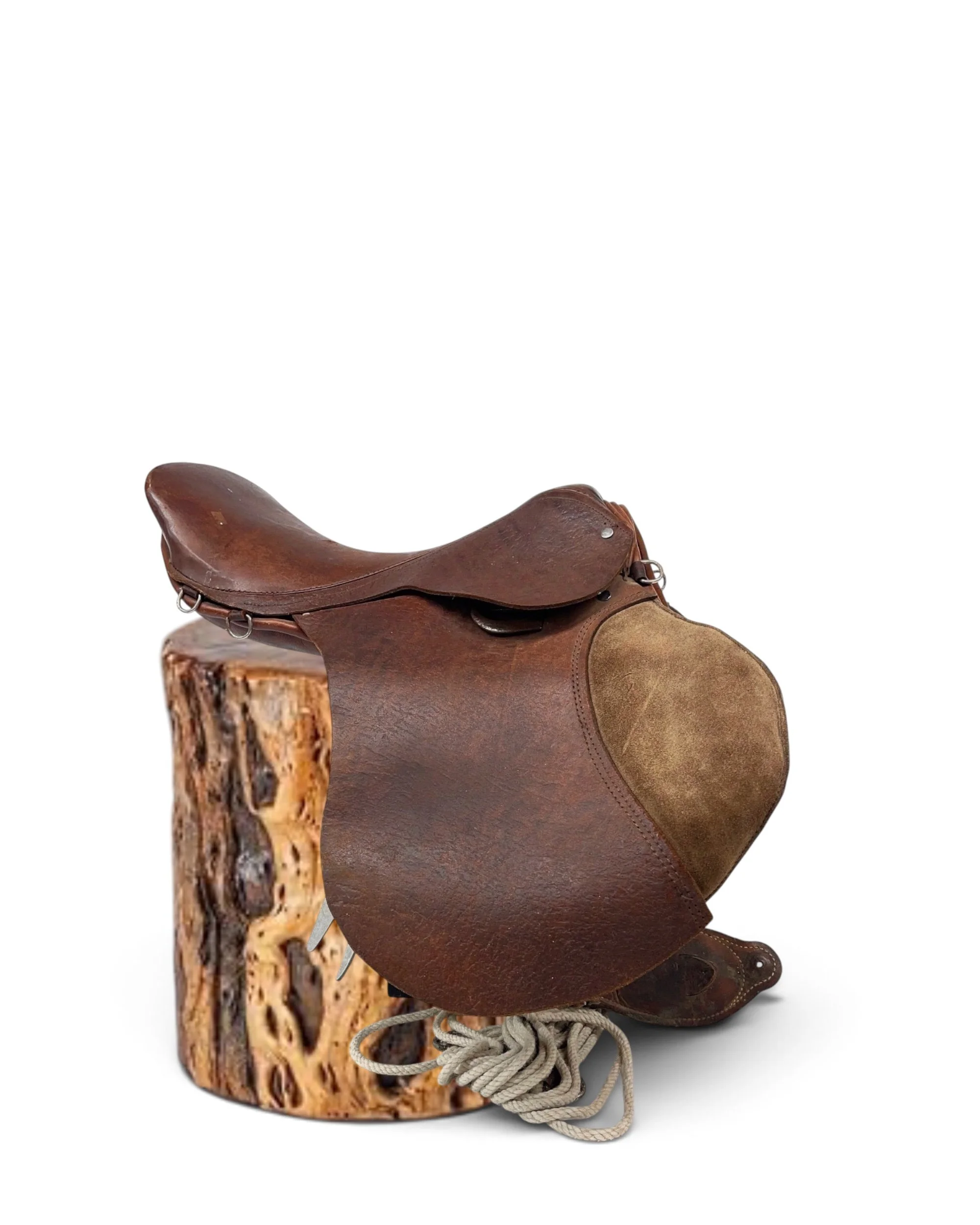 Vintage dark brown  leather English horse saddle with horse cinch.