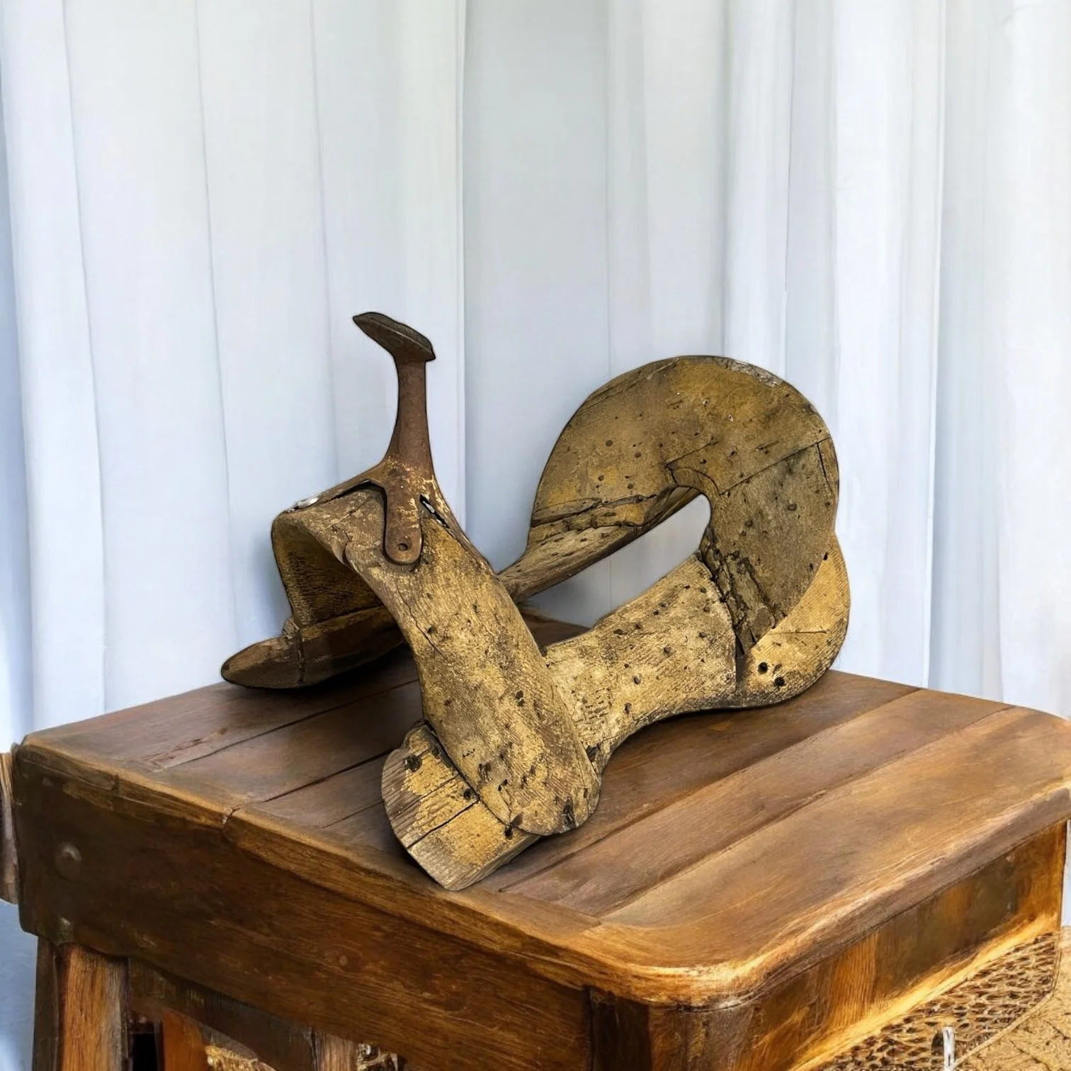 Vintage wooden saddle tree, handcrafted, weathered with rustic charm. Perfect for equestrian decor or decorating a cabin or lodge.
