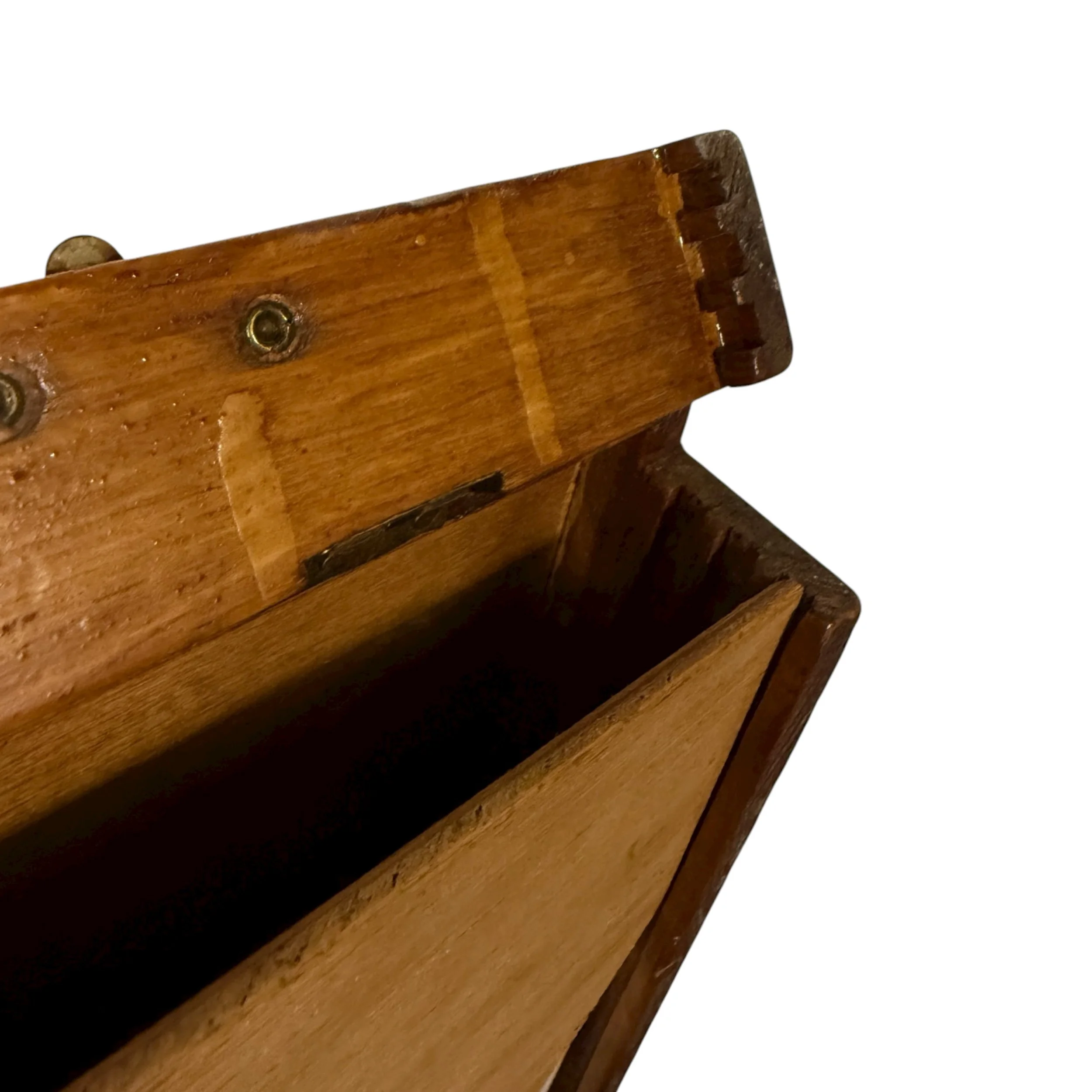 Side view of wooden artist supply storage box with metal hardware.
