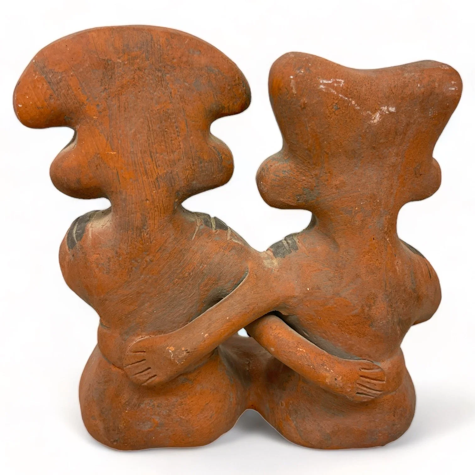Vintage Mexican terracotta clay figures set with folk art style, including a dance and a couple.