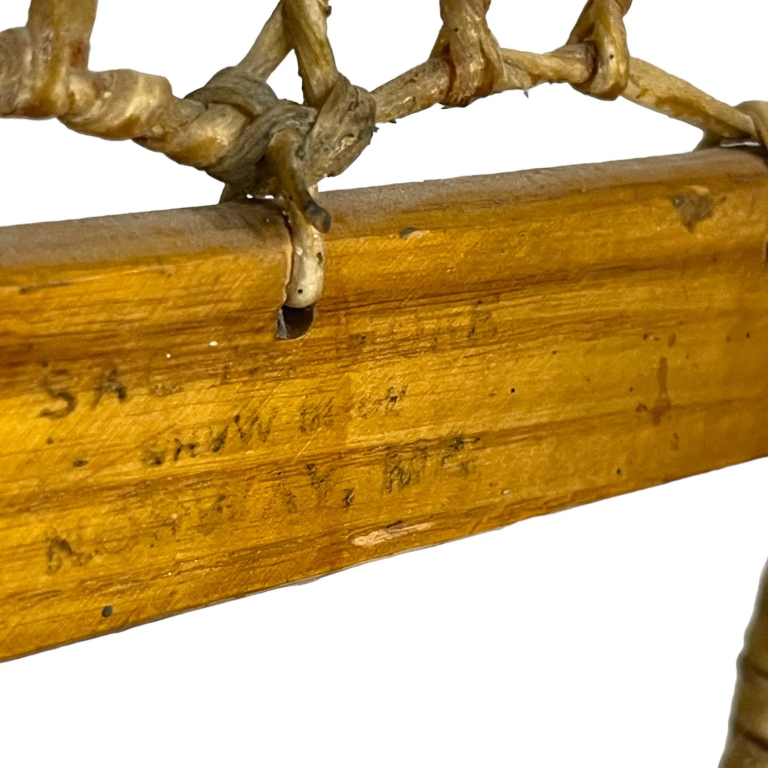 Pair of vintage wooden snowshoes with ski poles made of bamboo and cork - classic rustic winter gear perfect for cabin decor, lodge style, or outdoor adventures.